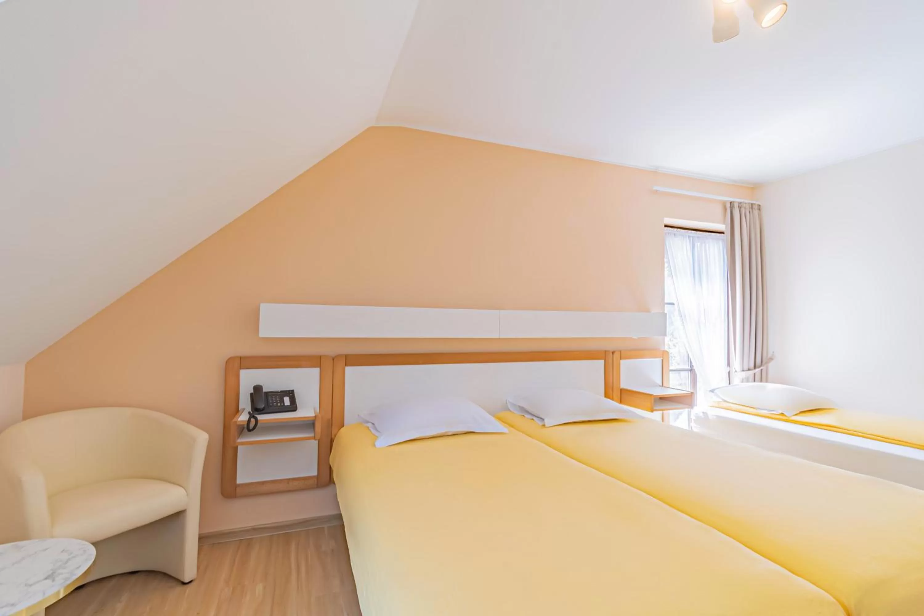 Bed in Hotel Le Postillon