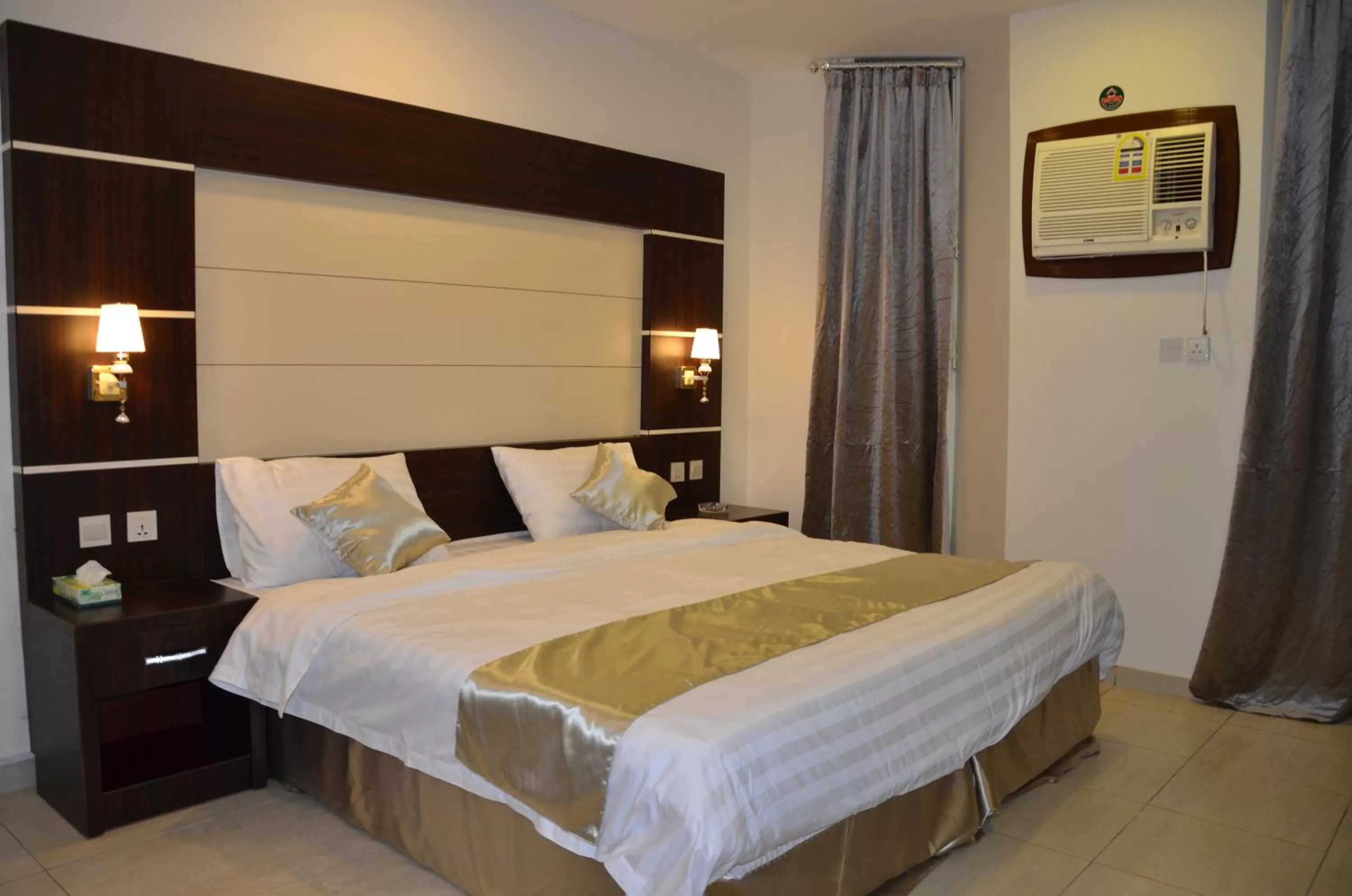 Bed in Jazan Heart Hotel