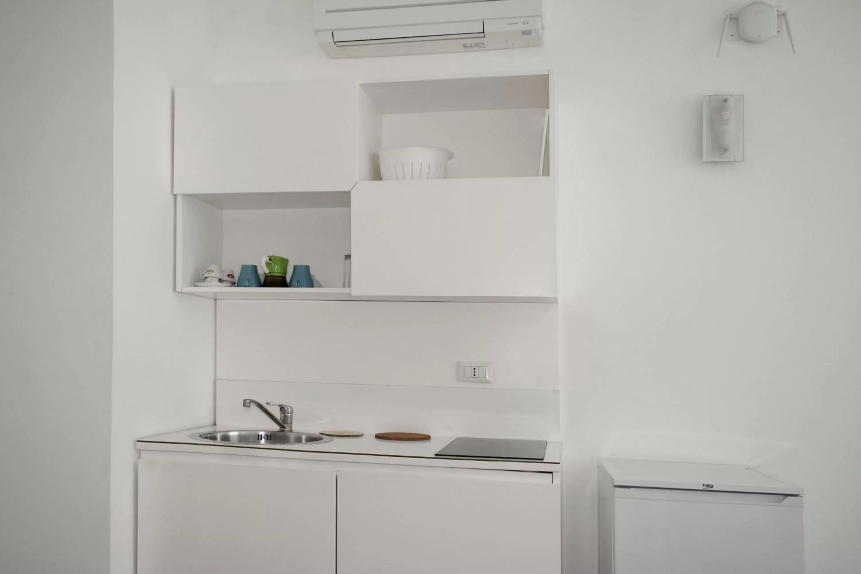 Kitchen or kitchenette in Roma Resort Colosseum