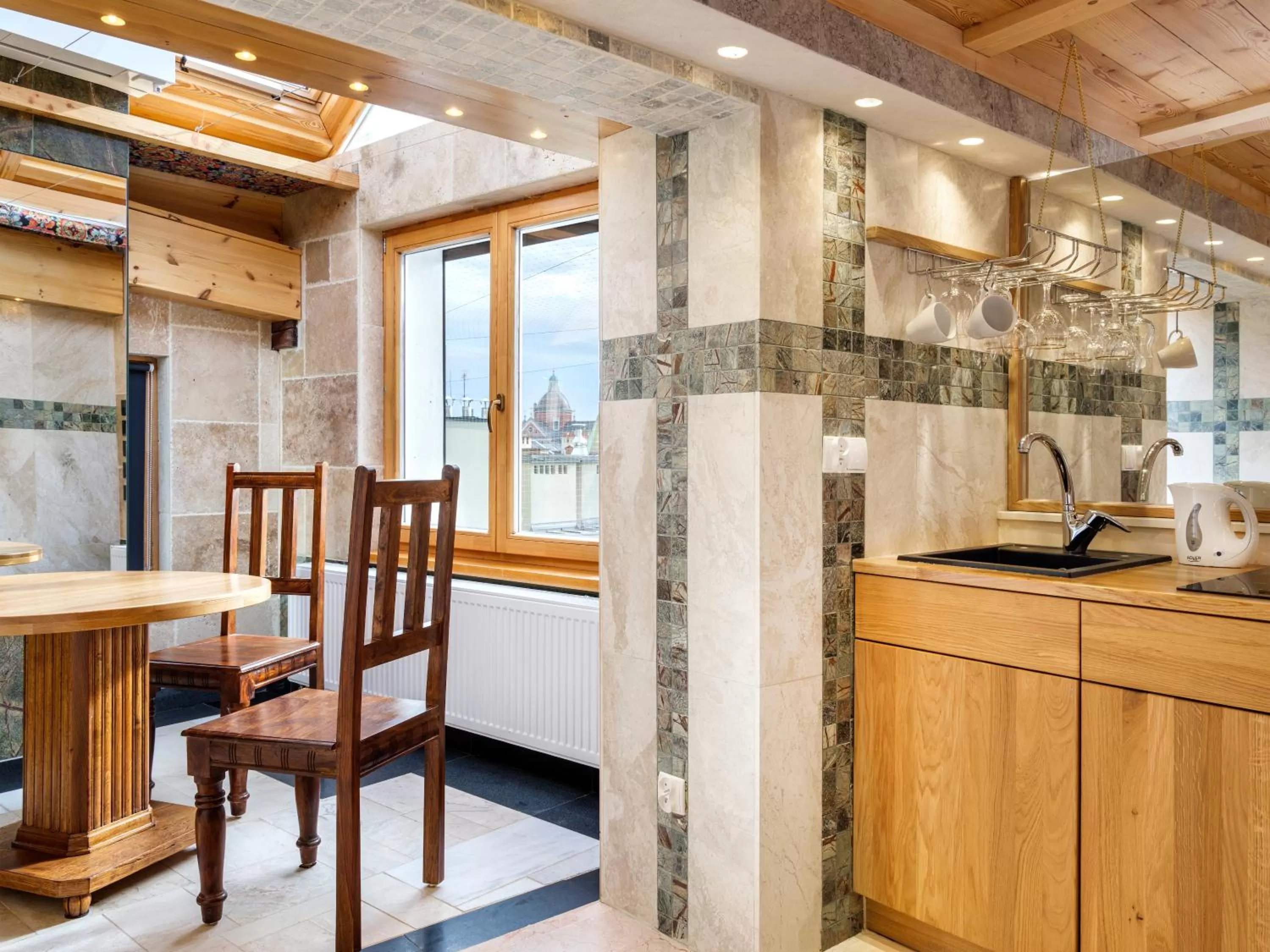 Kitchen or kitchenette in Aparthotel Stare Miasto