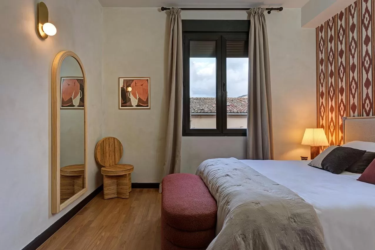 Bed, Mountain View in Hospedium Hotel La Farm