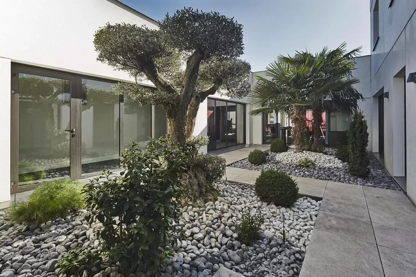 Garden, Property Building in Kyriad Prestige Lyon Est - Saint Priest Eurexpo Hotel and SPA