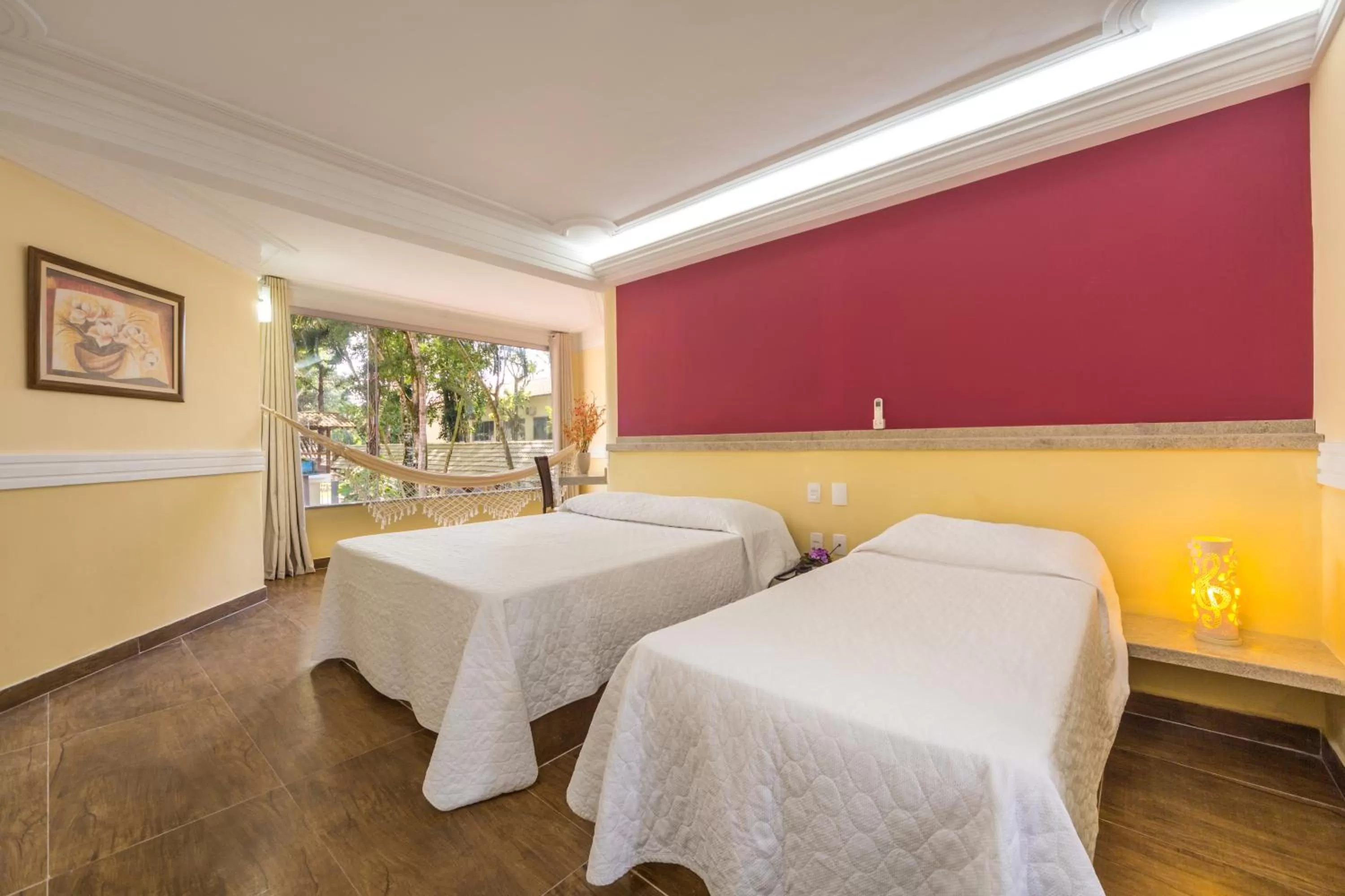 Bed in Floral Inn Family