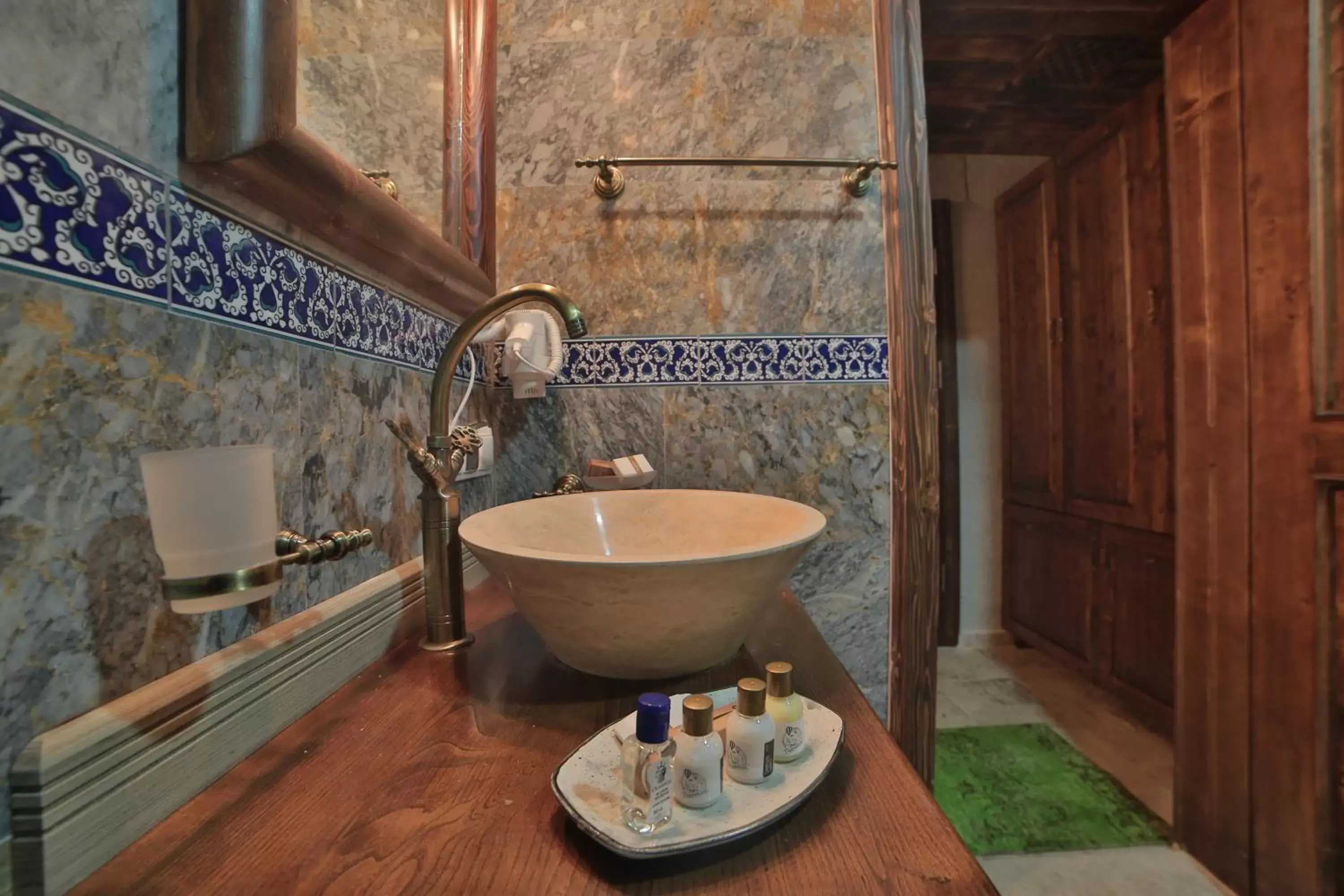 Bathroom in Caravanserai Inn Hotel