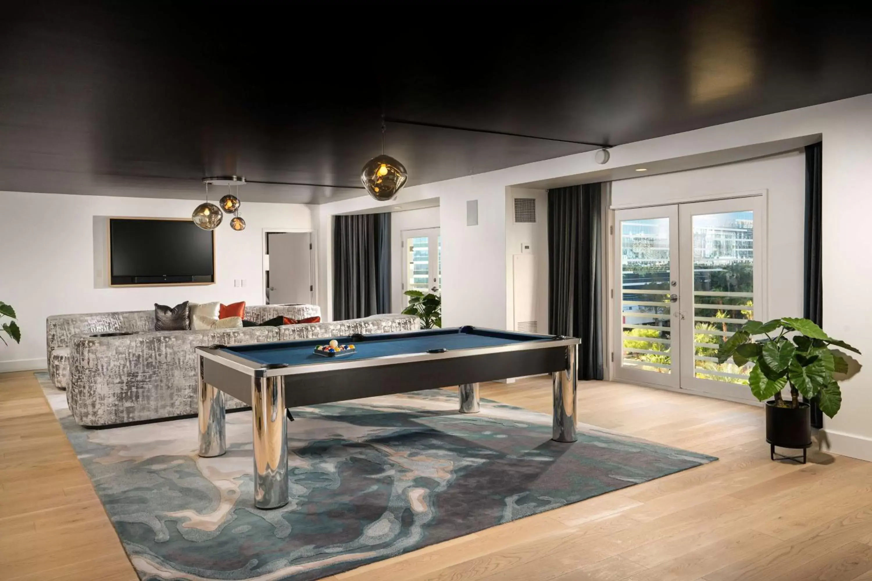 Living room, Billiards in Virgin Hotels Las Vegas, Curio Collection by Hilton