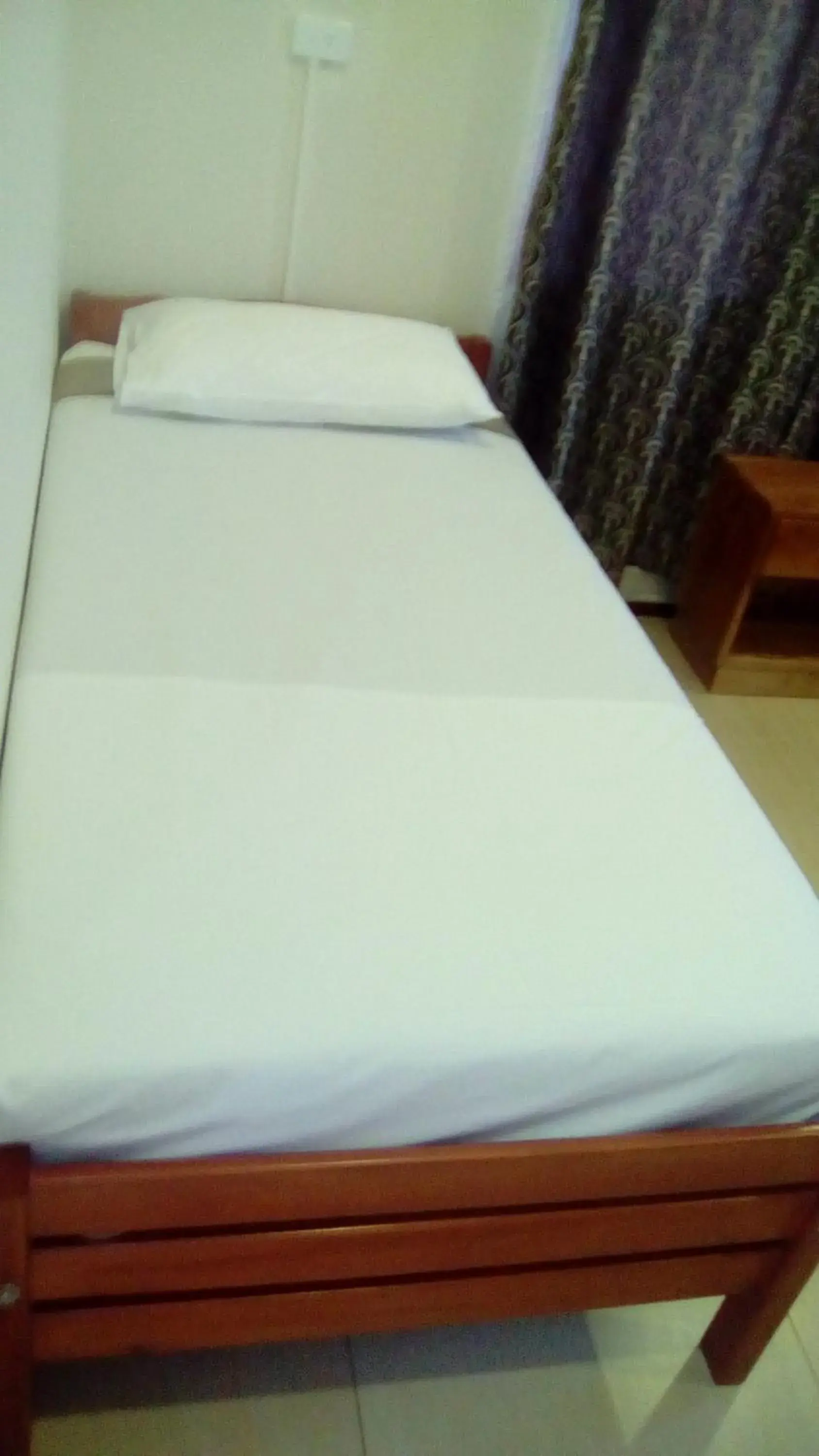 Bed in Al - Minhaj Service Apartments