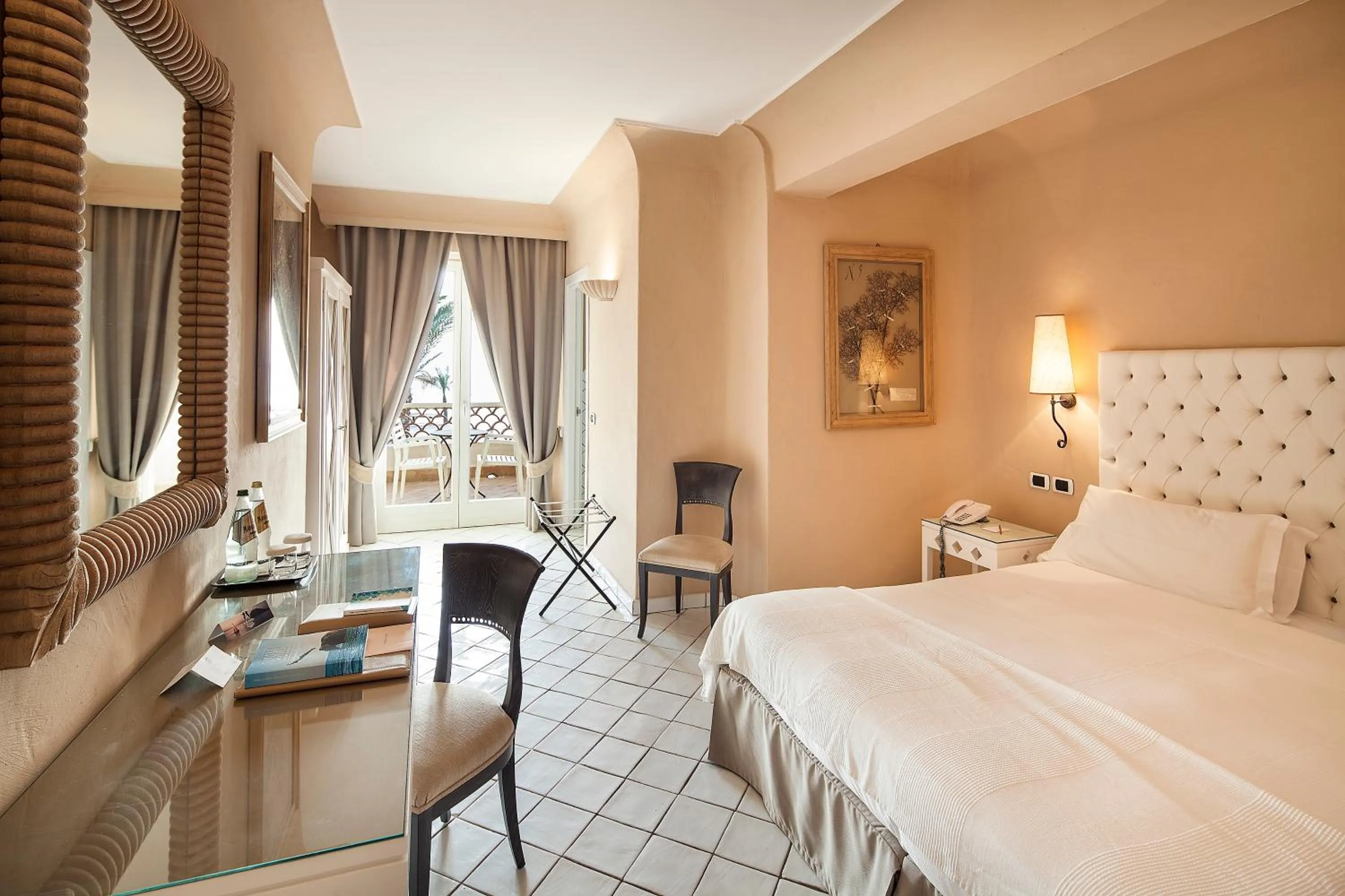 Balcony/Terrace, Bed in Therasia Resort Sea and SPA - The Leading Hotels of the World