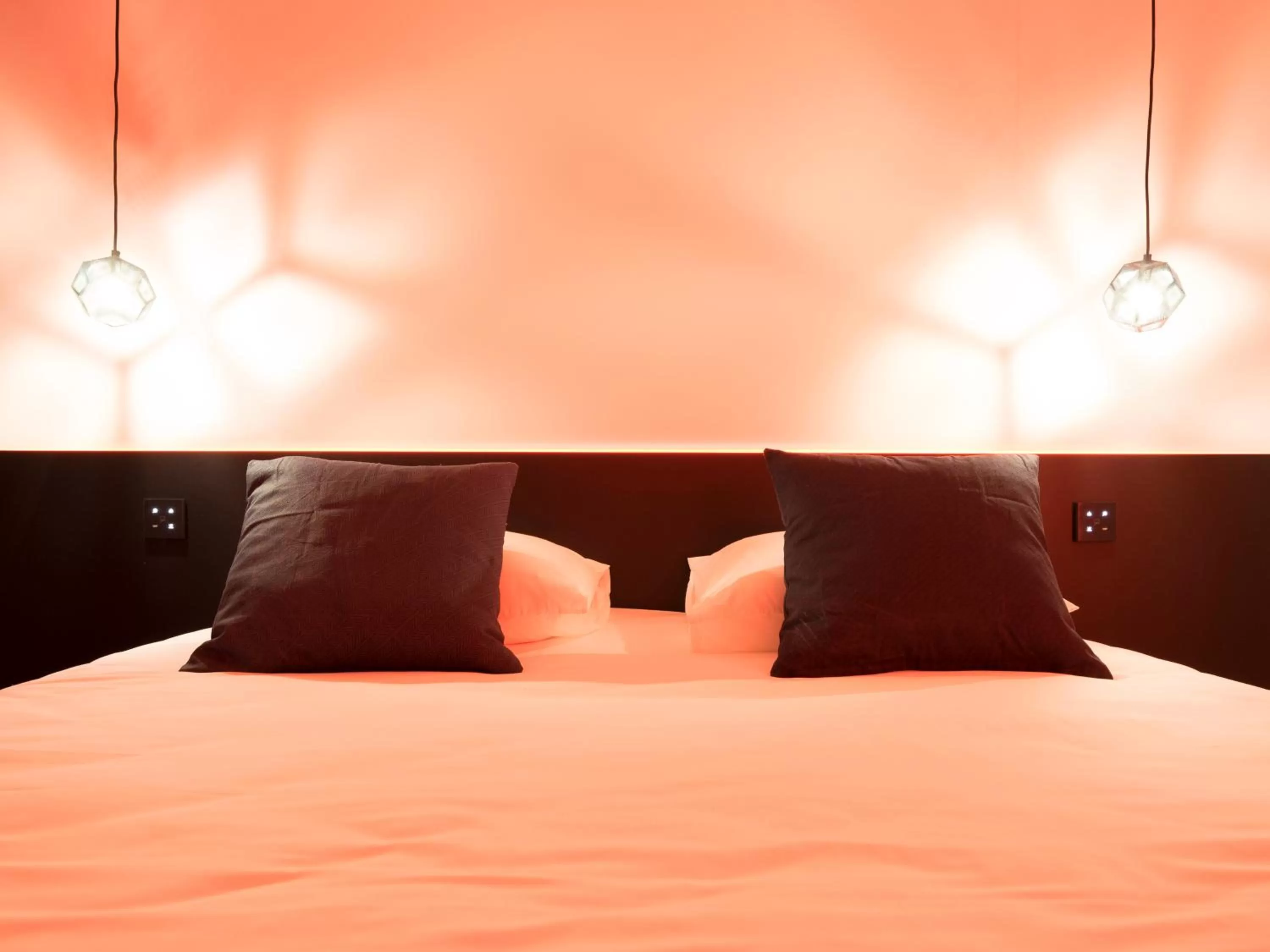 Bed in MiHotel Vieux Lyon