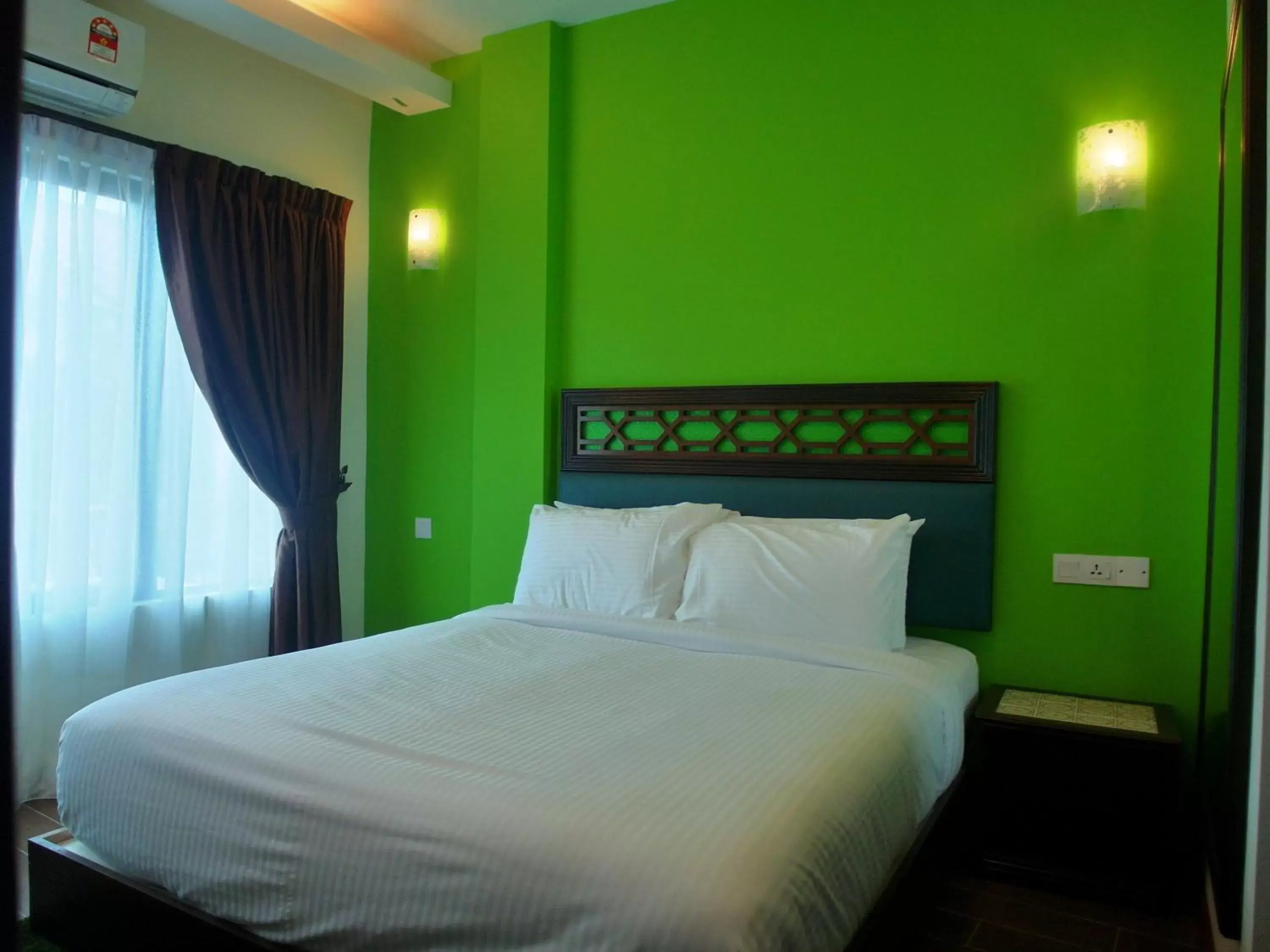 Bed in Swiss Hotel Heritage Boutique Melaka