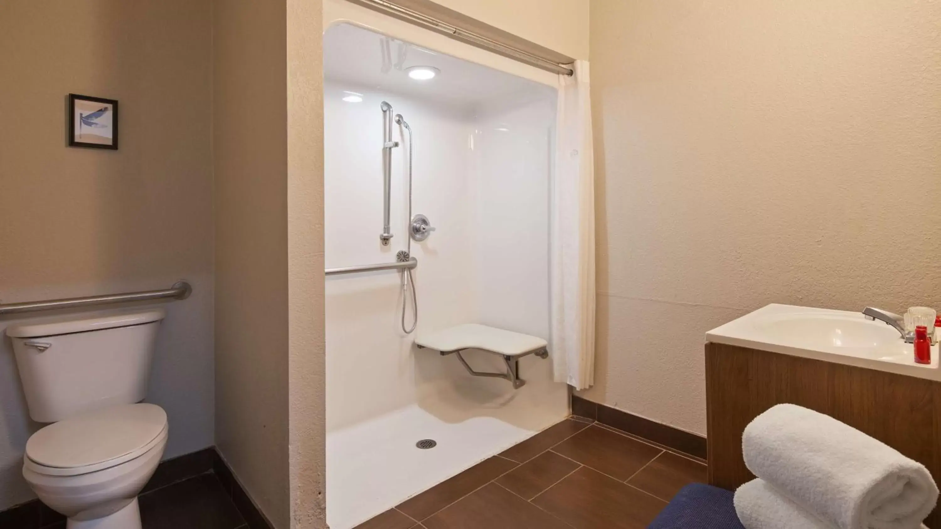 Bathroom in SureStay Plus by Best Western San Antonio Fort Sam Houston