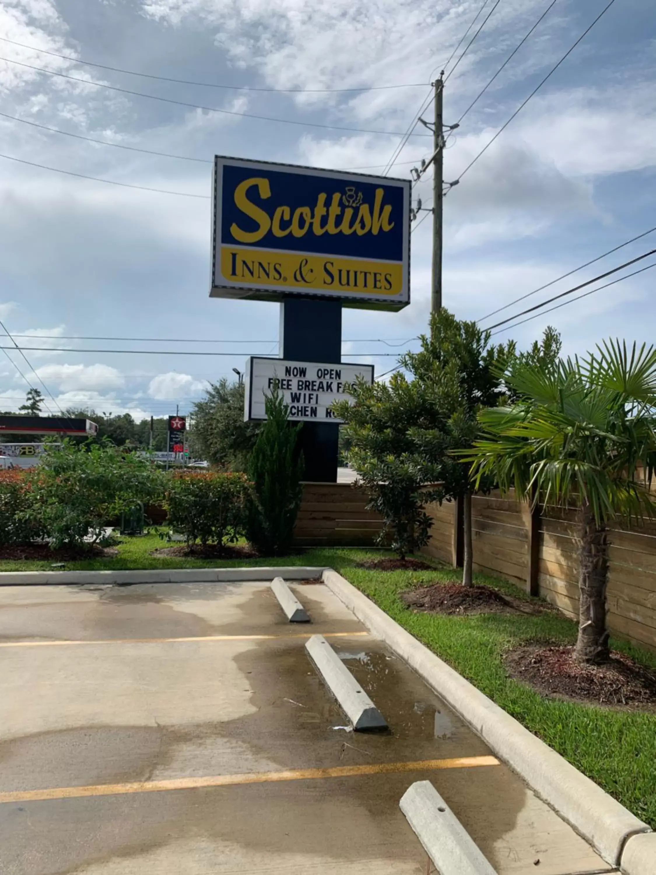 Property logo or sign in Scottish Inn & Suites - IAH Airport