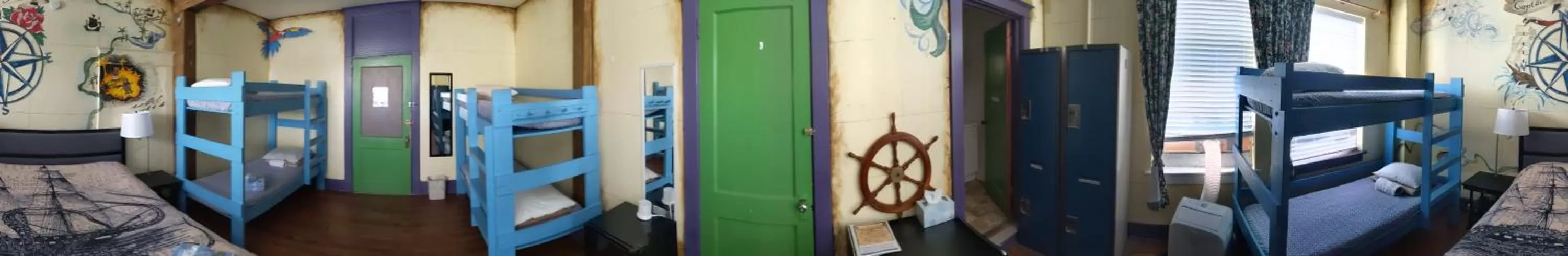 Bed in The Pirate Haus Inn