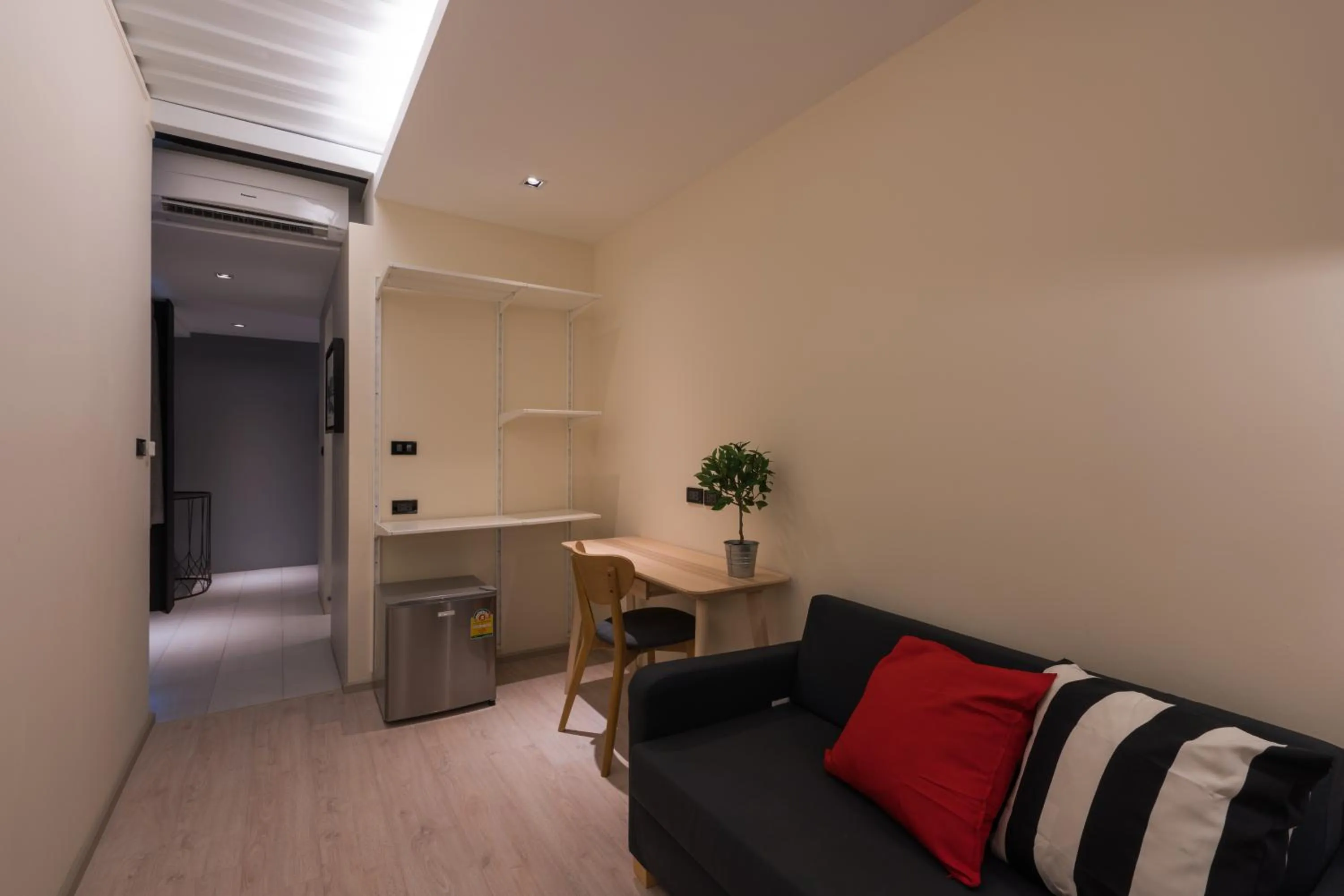 Seating area in Sleep Box Hotel Sukhumvit 22