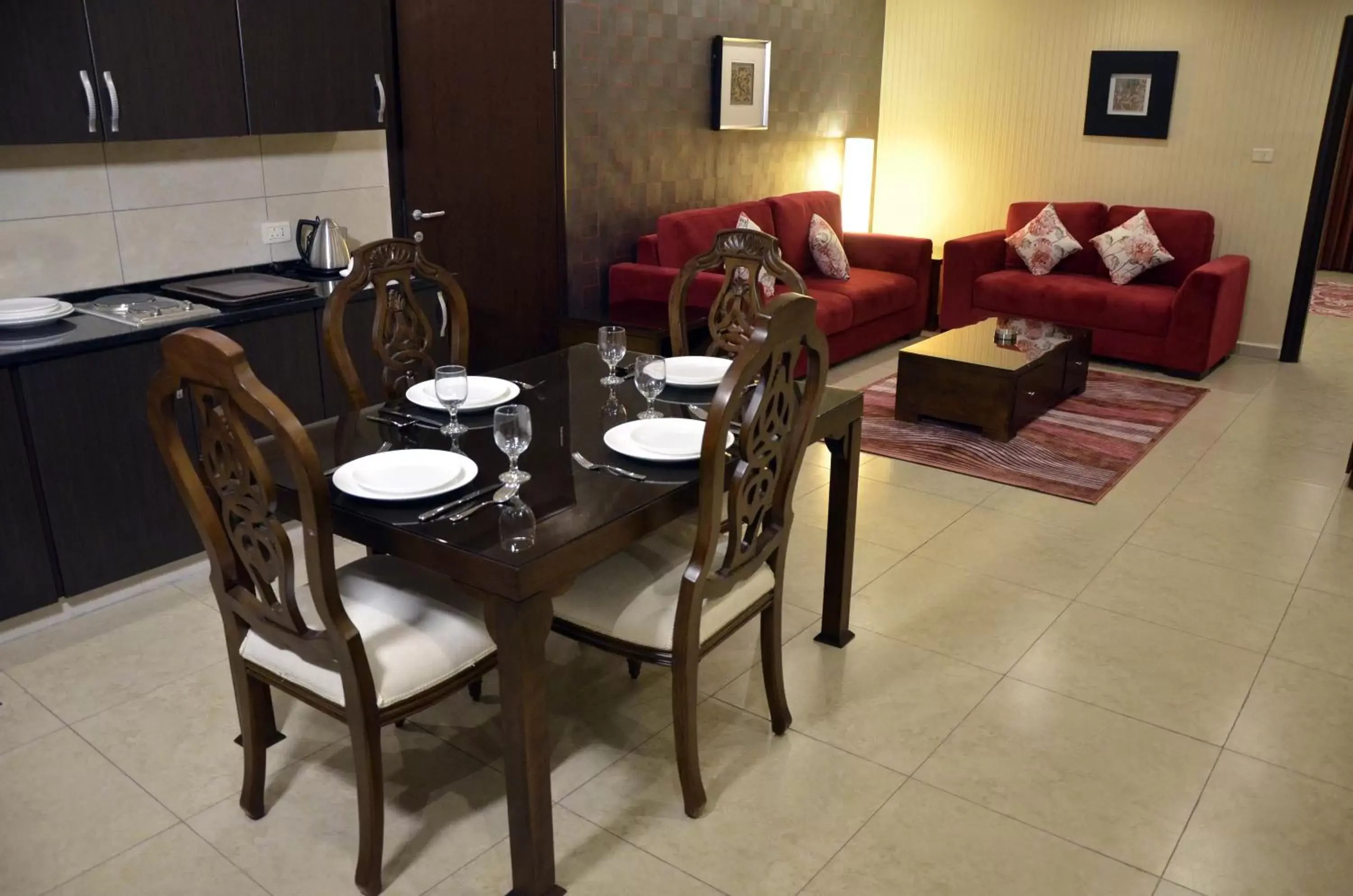 Living room, Dining Area in City Rose Hotel Suites