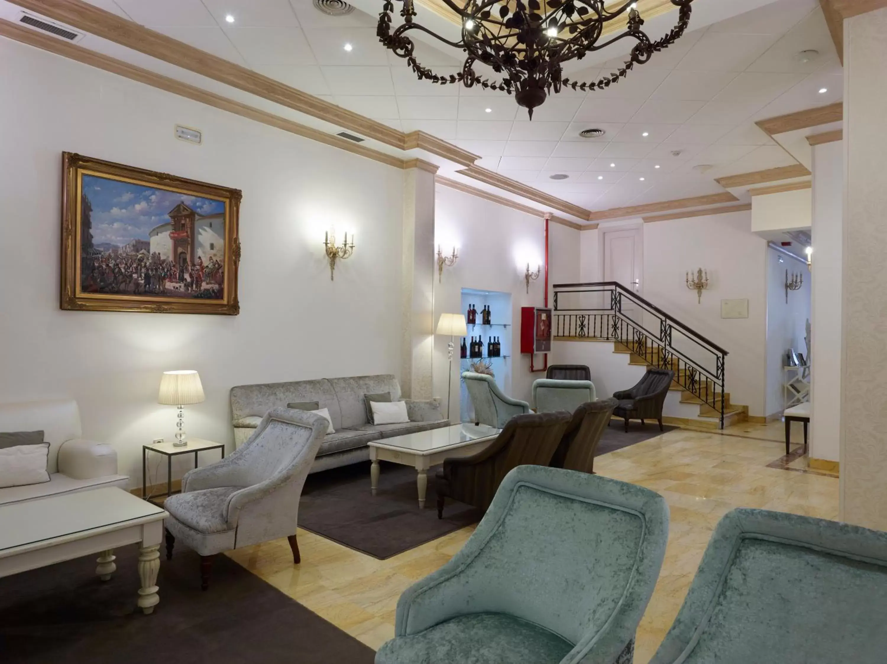Communal lounge/ TV room, Seating Area in Hotel Maestranza