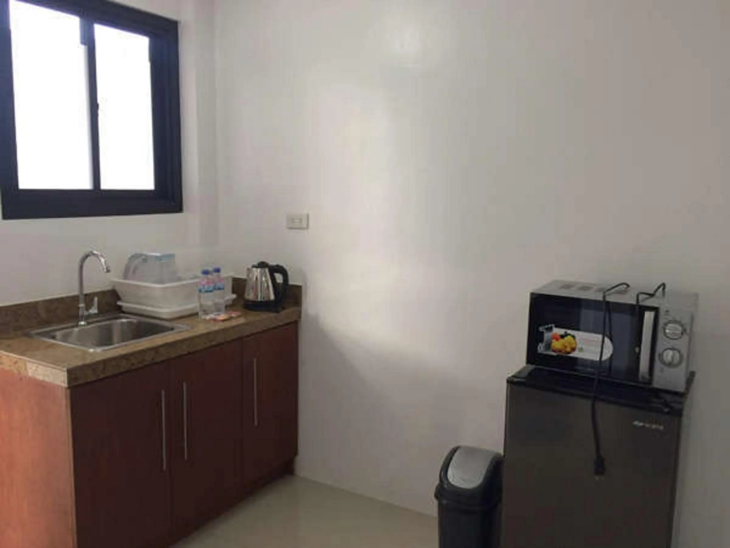 Photo of the whole room in The Palines Apartment Hotel near Brittany Palazzo, Evia Mall Alabang