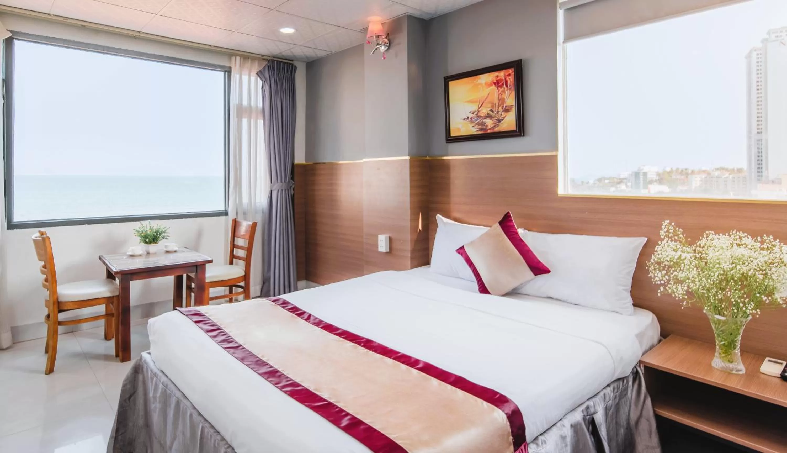 Bed in Arise Seaside Hotel