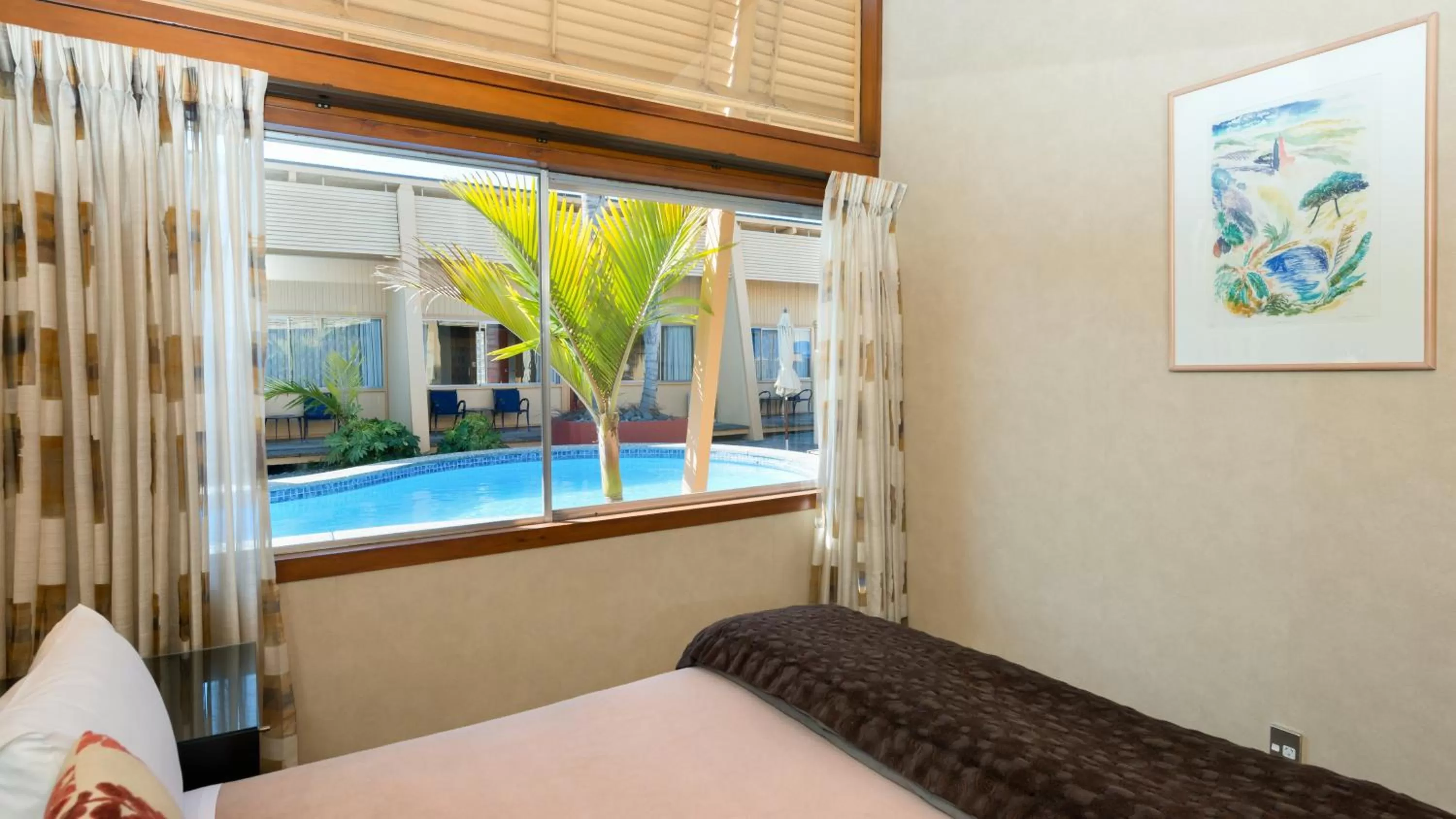 Day, Bed in Oasis Beach Motel