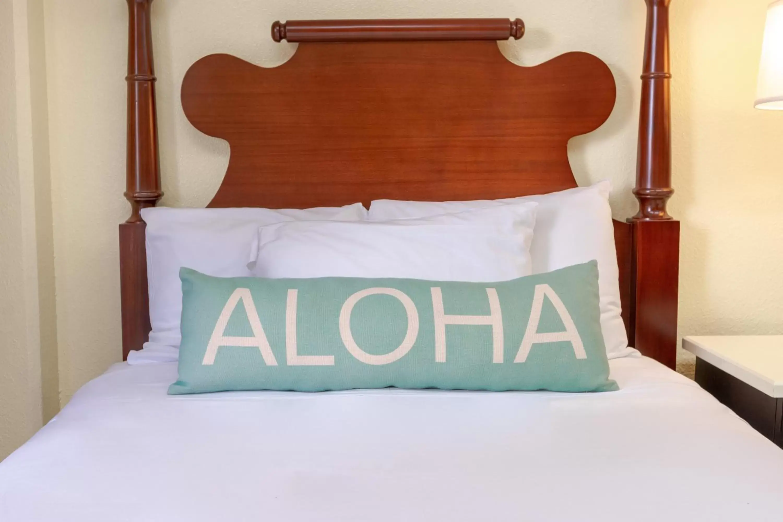 Bed in Ohia Waikiki Studio Suites