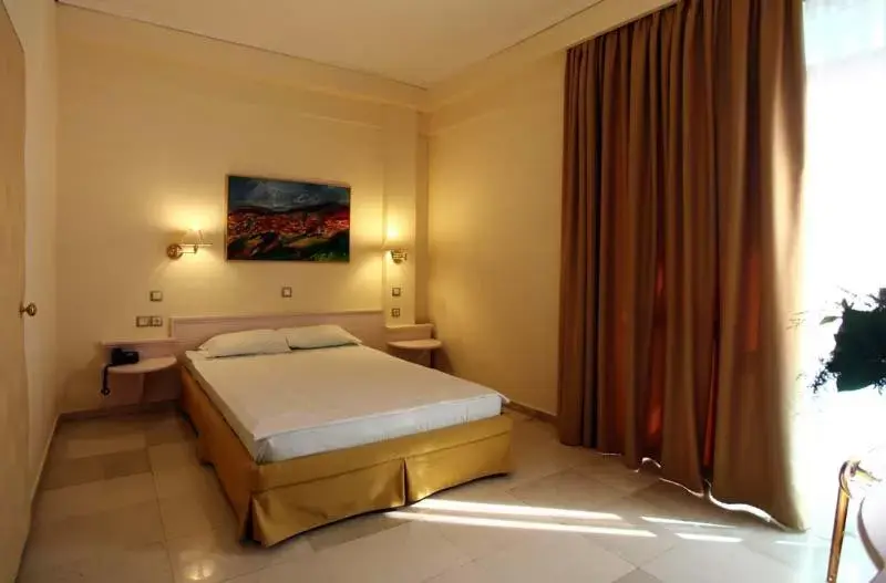 Bed in Hotel Metropol