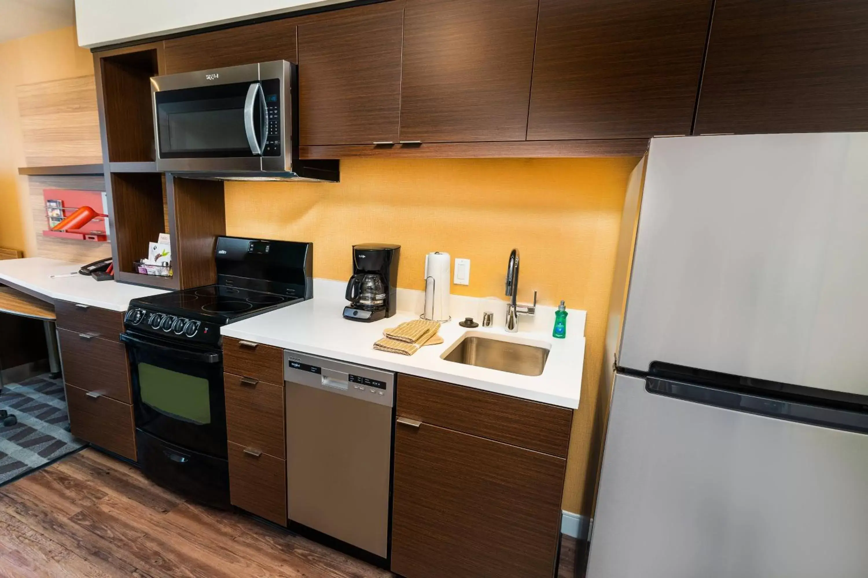 Bedroom, Kitchen/Kitchenette in TownePlace Suites By Marriott Las Vegas Stadium District