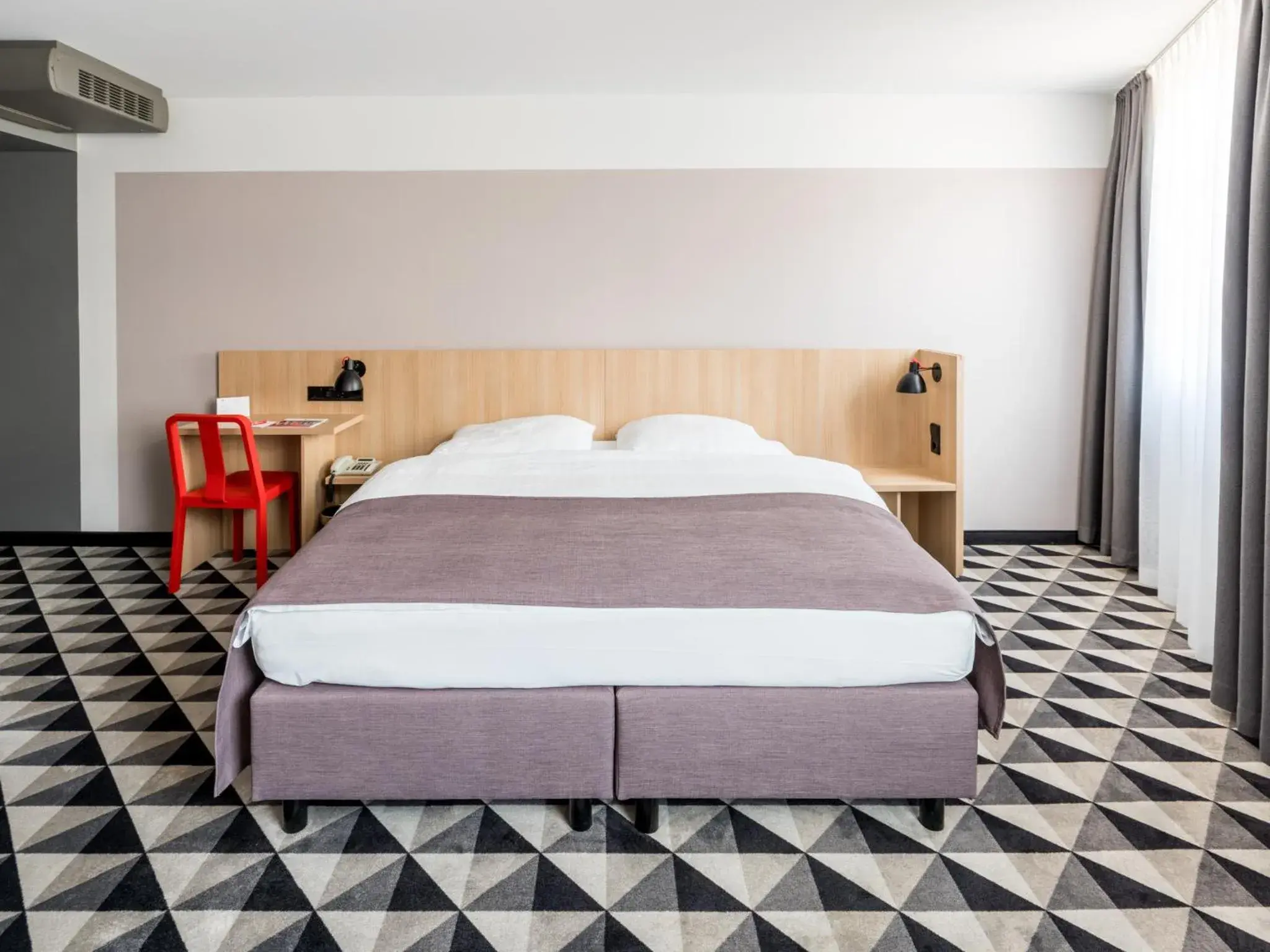 Bed in acom-Hotel Vienna