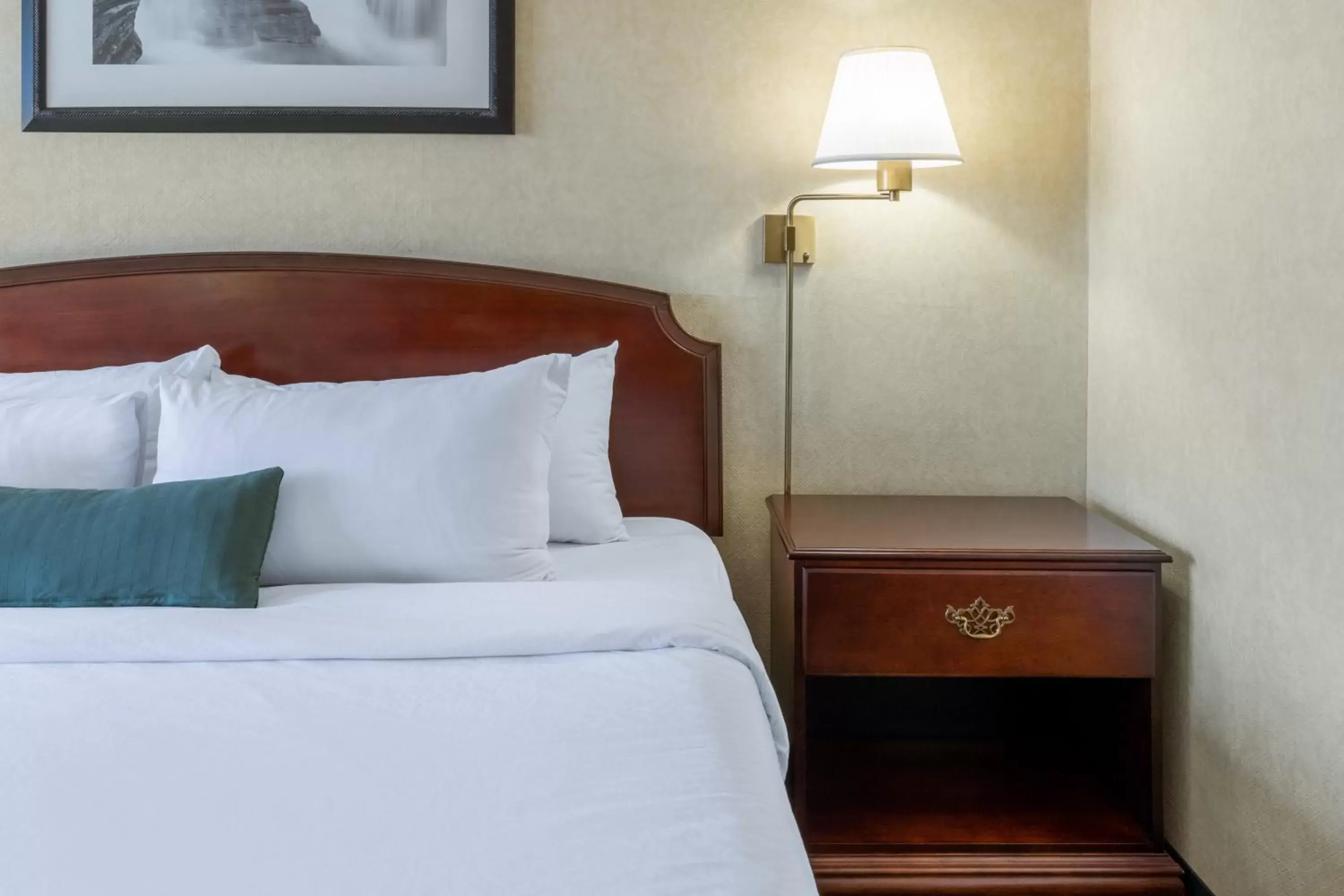 Bed in Ramada by Wyndham Reno Hotel & Casino