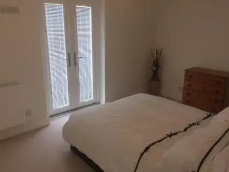 Bed in The Corbyn Apartments