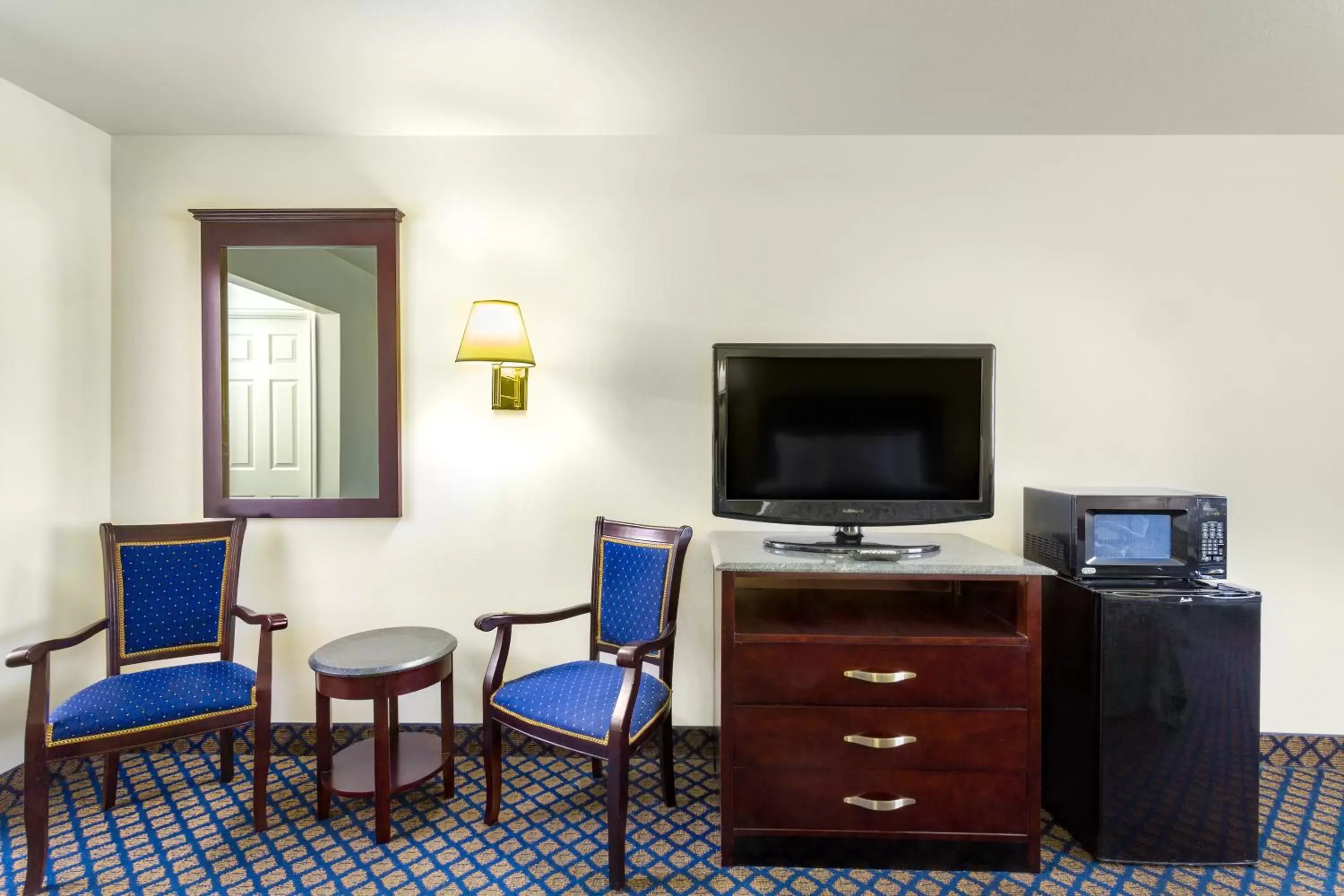 TV and multimedia, TV/Entertainment Center in Days Inn by Wyndham Delta