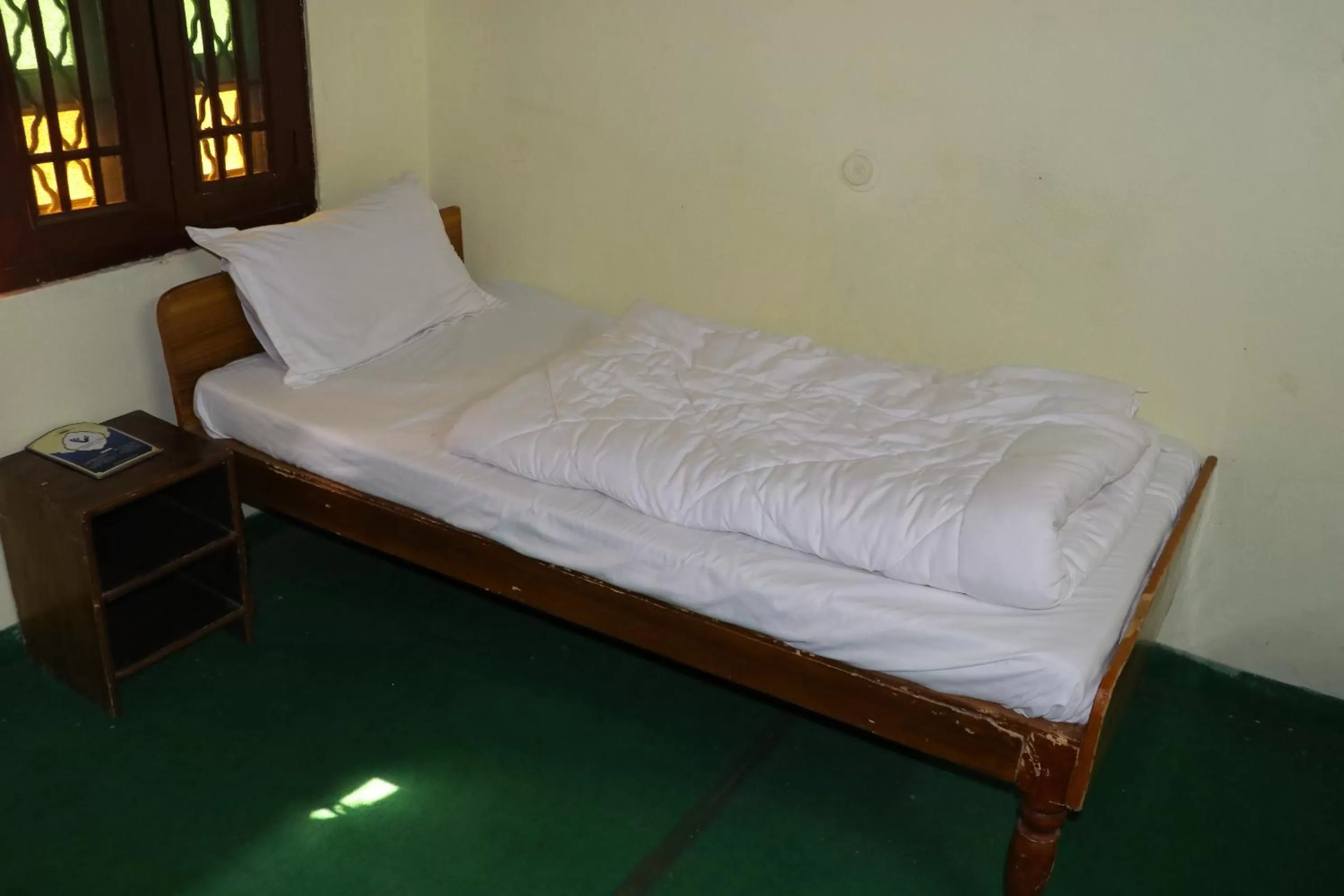 Bed in The Maurvi Inn