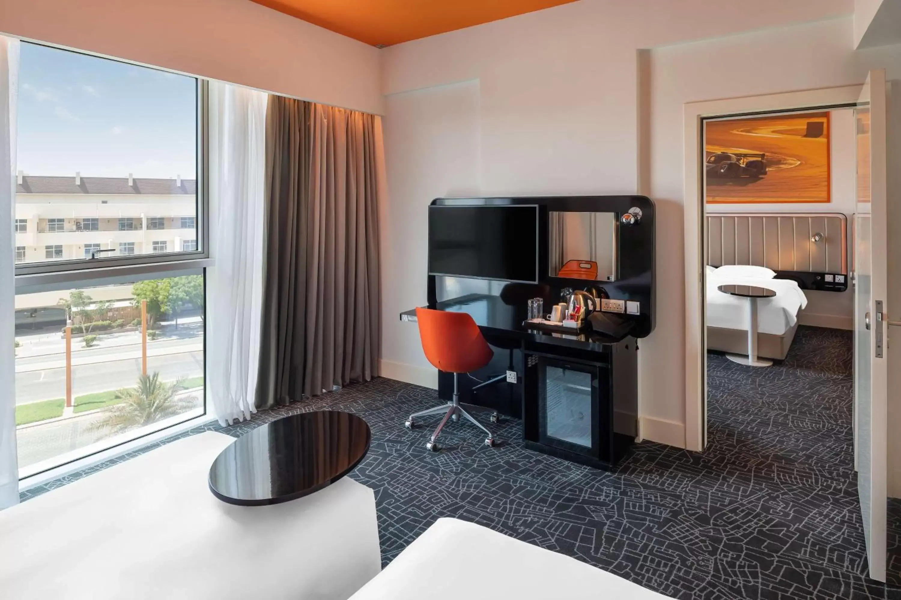 Bedroom, TV/Entertainment Center in Park Inn by Radisson Dubai Motor City