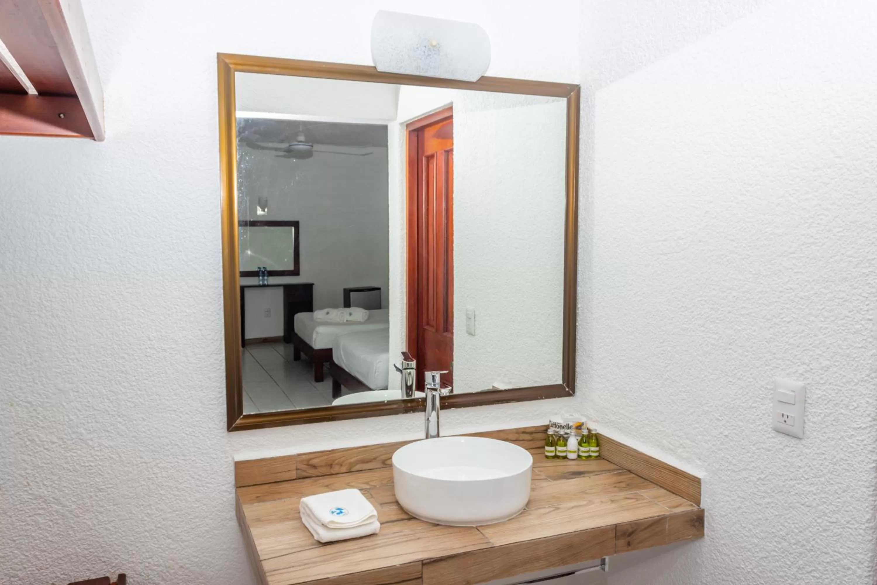 Toilet in Pelicano Inn Playa del Carmen - Beachfront Hotel