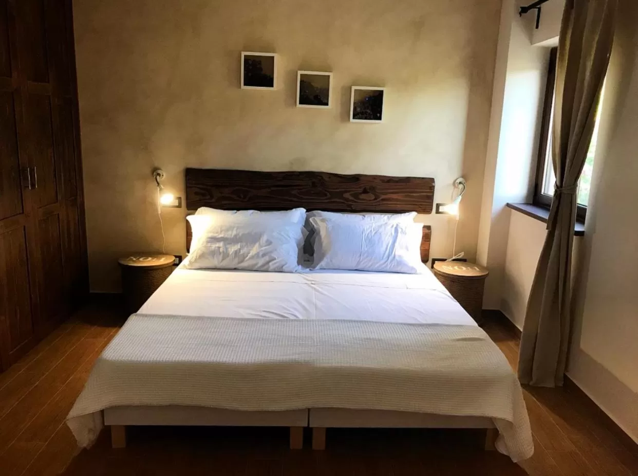 Bed in LA PERGOLA - Affitta Camere