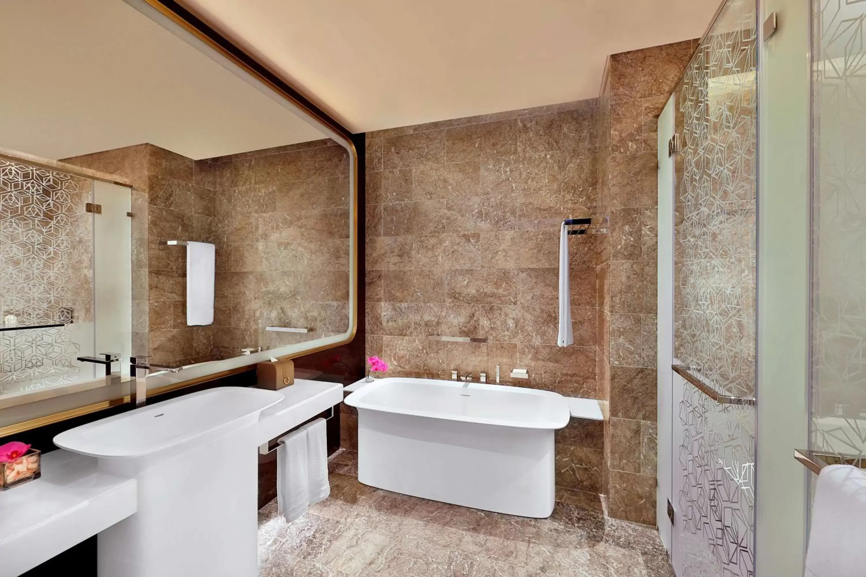 Bathroom in AlRayyan Hotel Doha, Curio Collection by Hilton