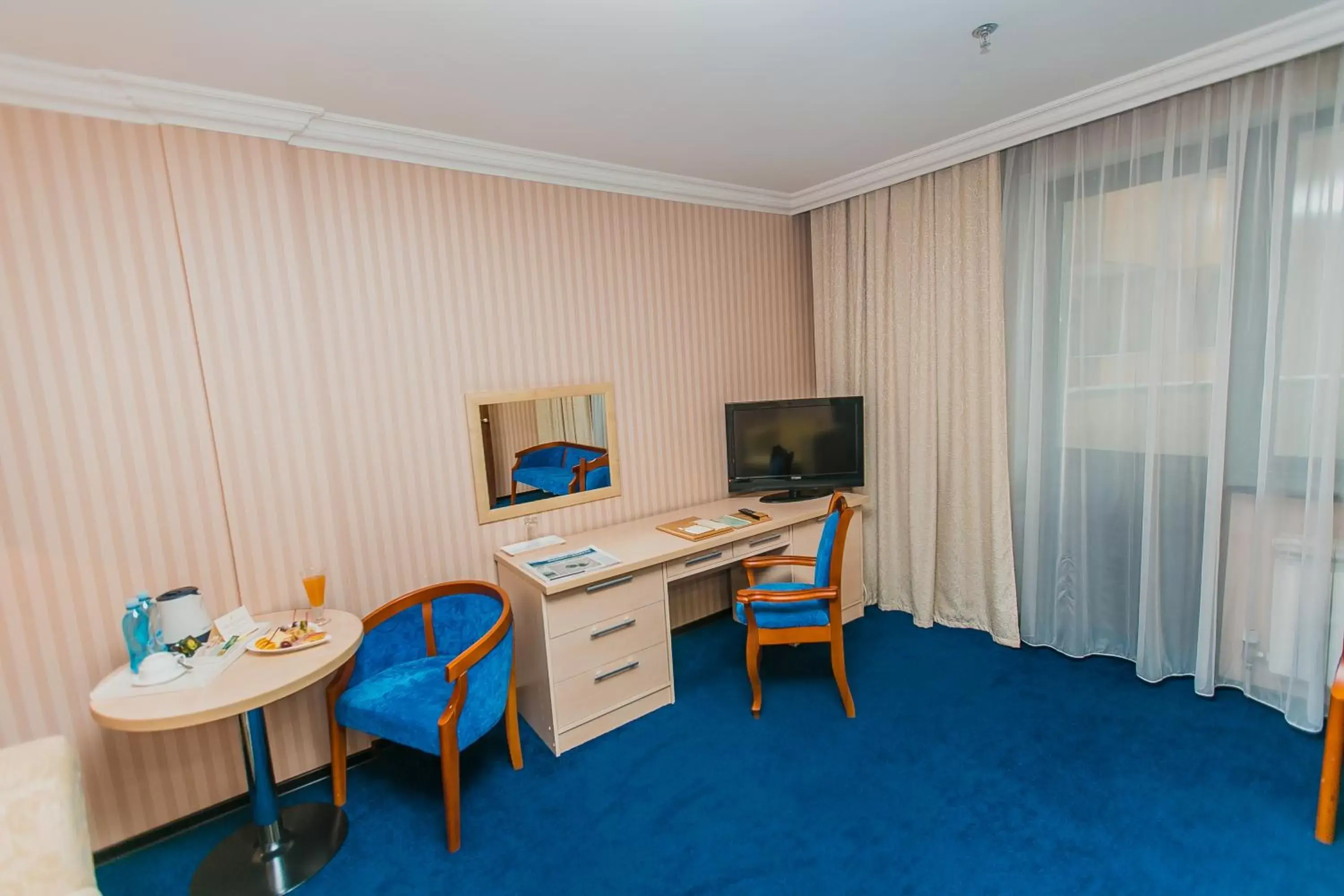 TV and multimedia, TV/Entertainment Center in King Hotel Astana