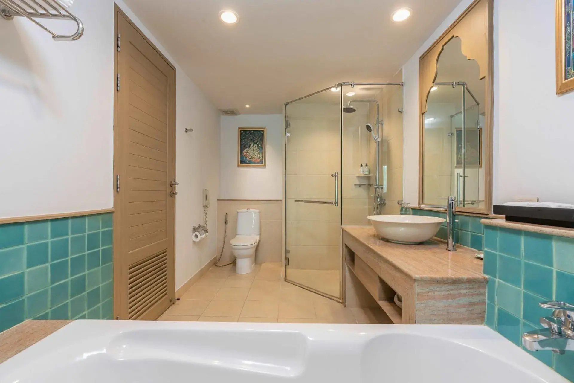 Bathroom in Ravindra Beach Resort & Spa - SHA Extra Plus
