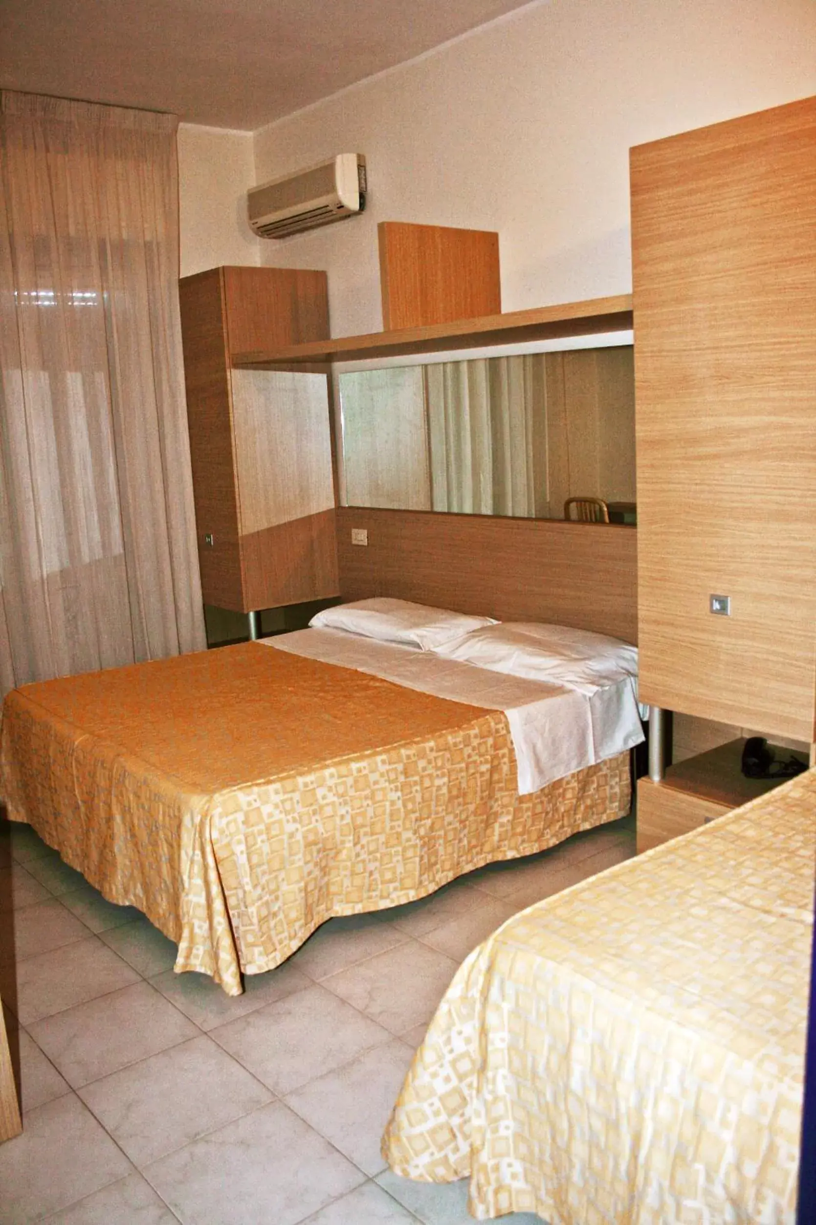 Bed in Hotel Felicioni