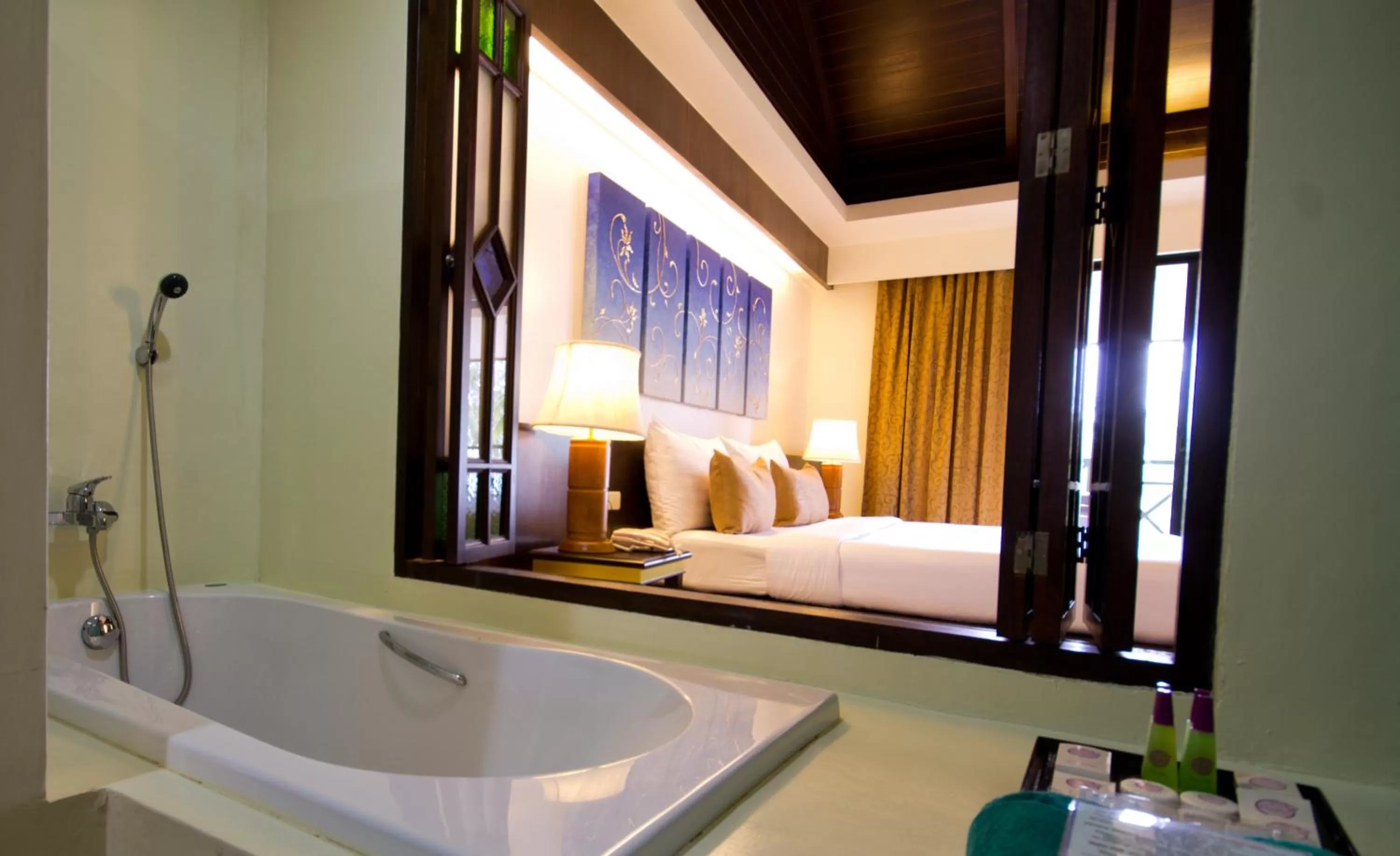 Bathroom, Bed in Khaolak Orchid Beach Resort - SHA Extra Plus
