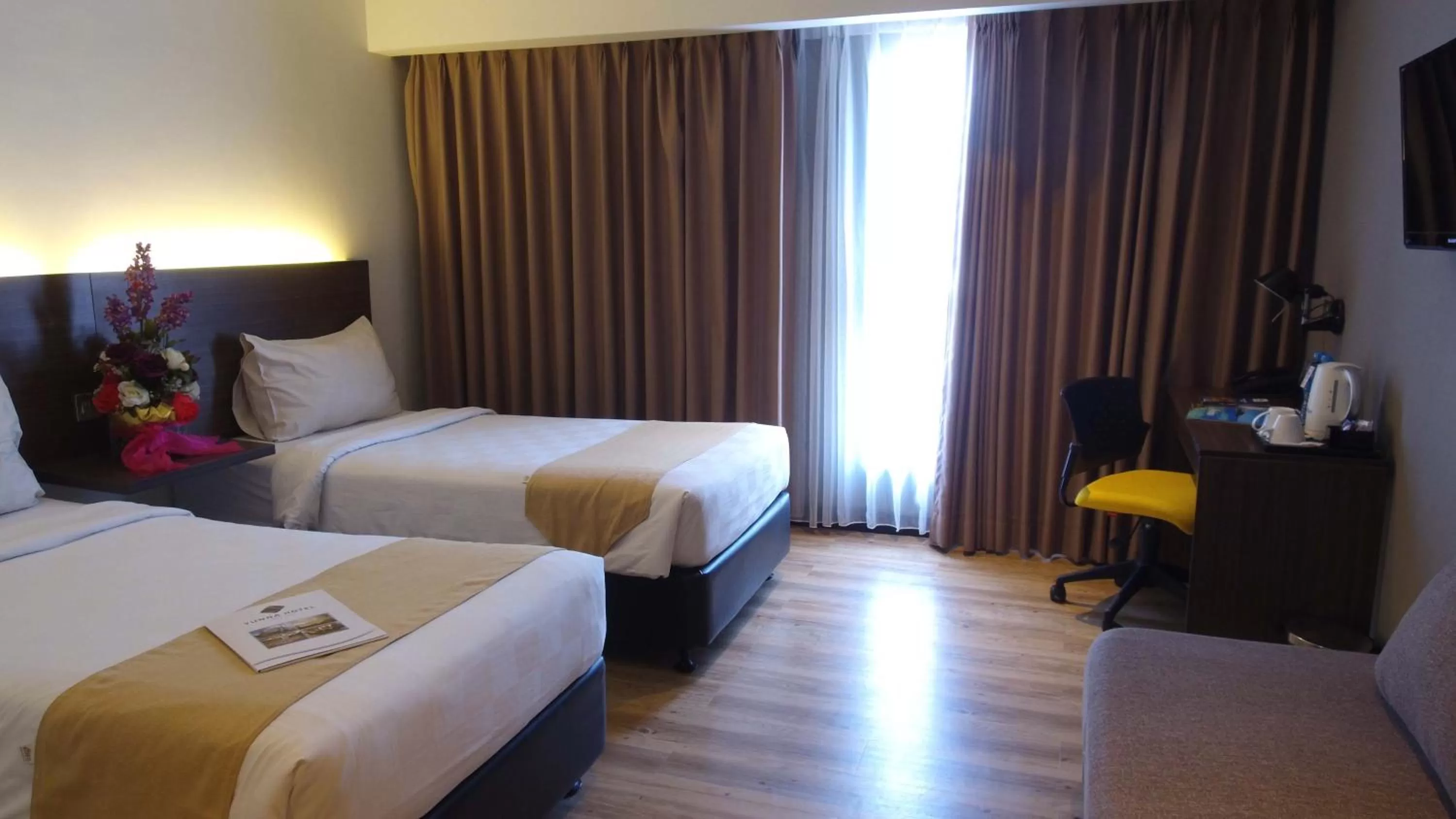 Bedroom, Bed in Yunna Hotel Lampung