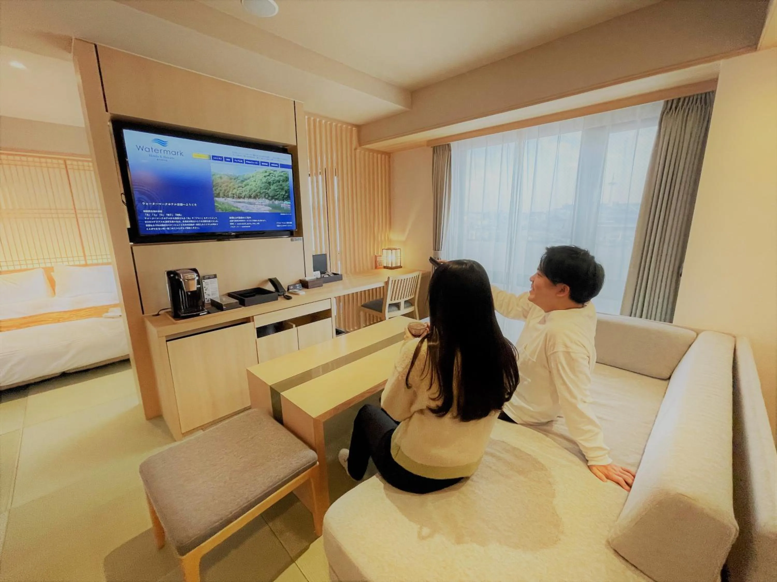 People in Henn na Hotel Premier Kyoto Gojo Karasuma -Formerly Watermark Hotel Kyoto-