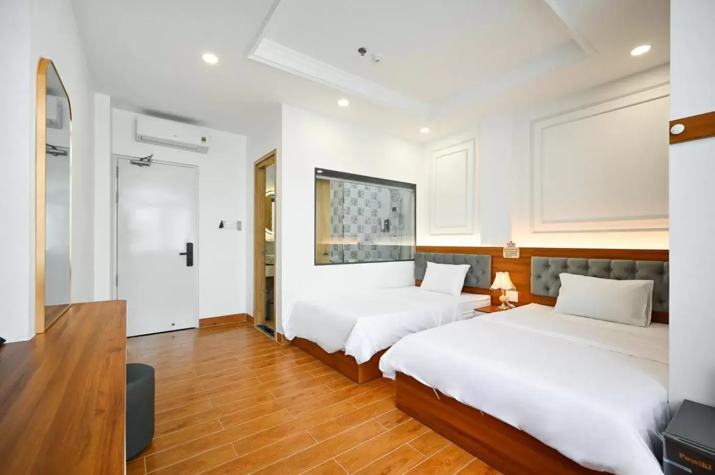 Deluxe Triple Room in Lotus Airport Hotel Saigon Deluxe Triple Room in Lotus Airport Hotel Saigon