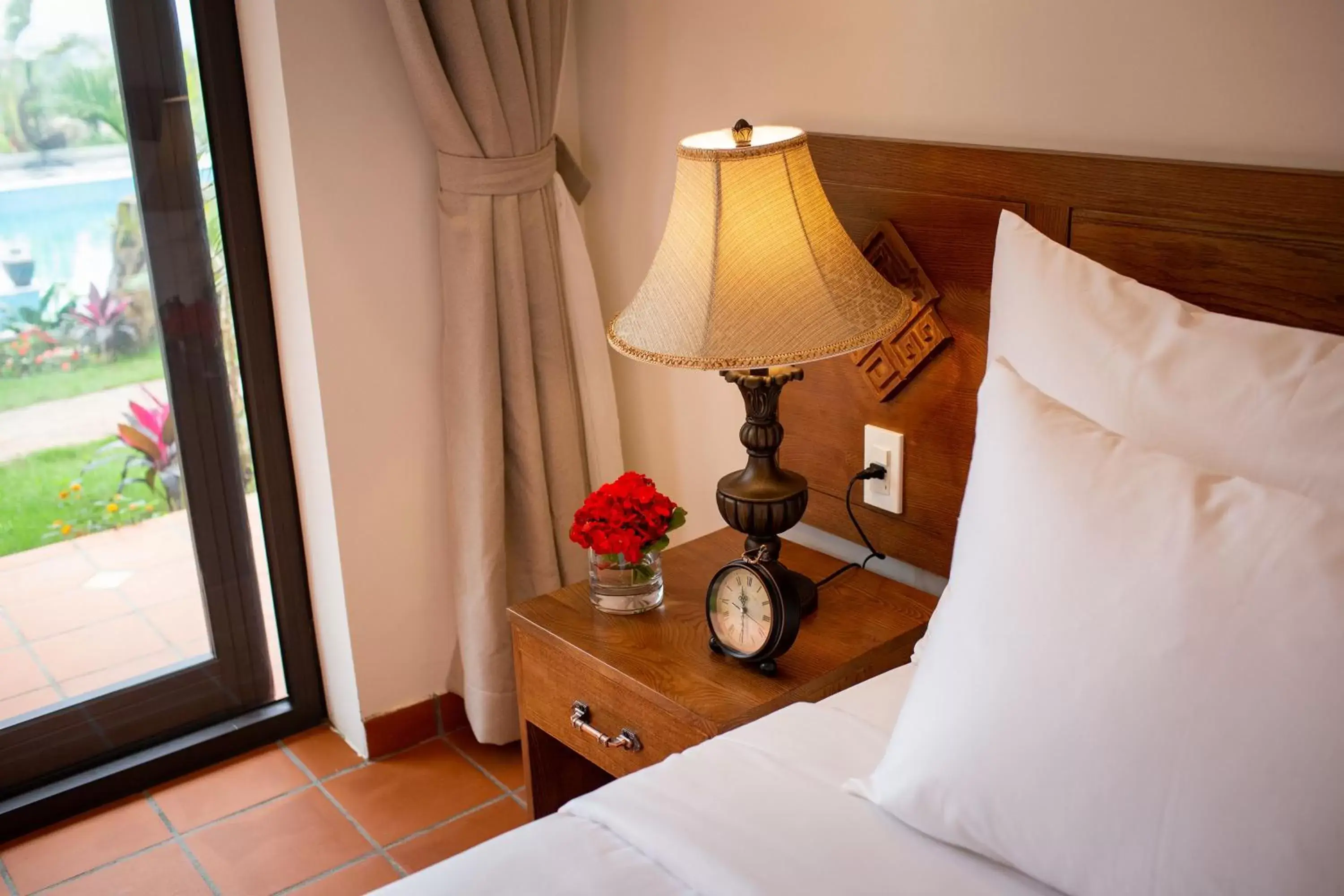 Deluxe Double Room with Pool View in Bai Dinh Garden Resort & Spa Deluxe Double Room with Pool View in Bai Dinh Garden Resort & Spa