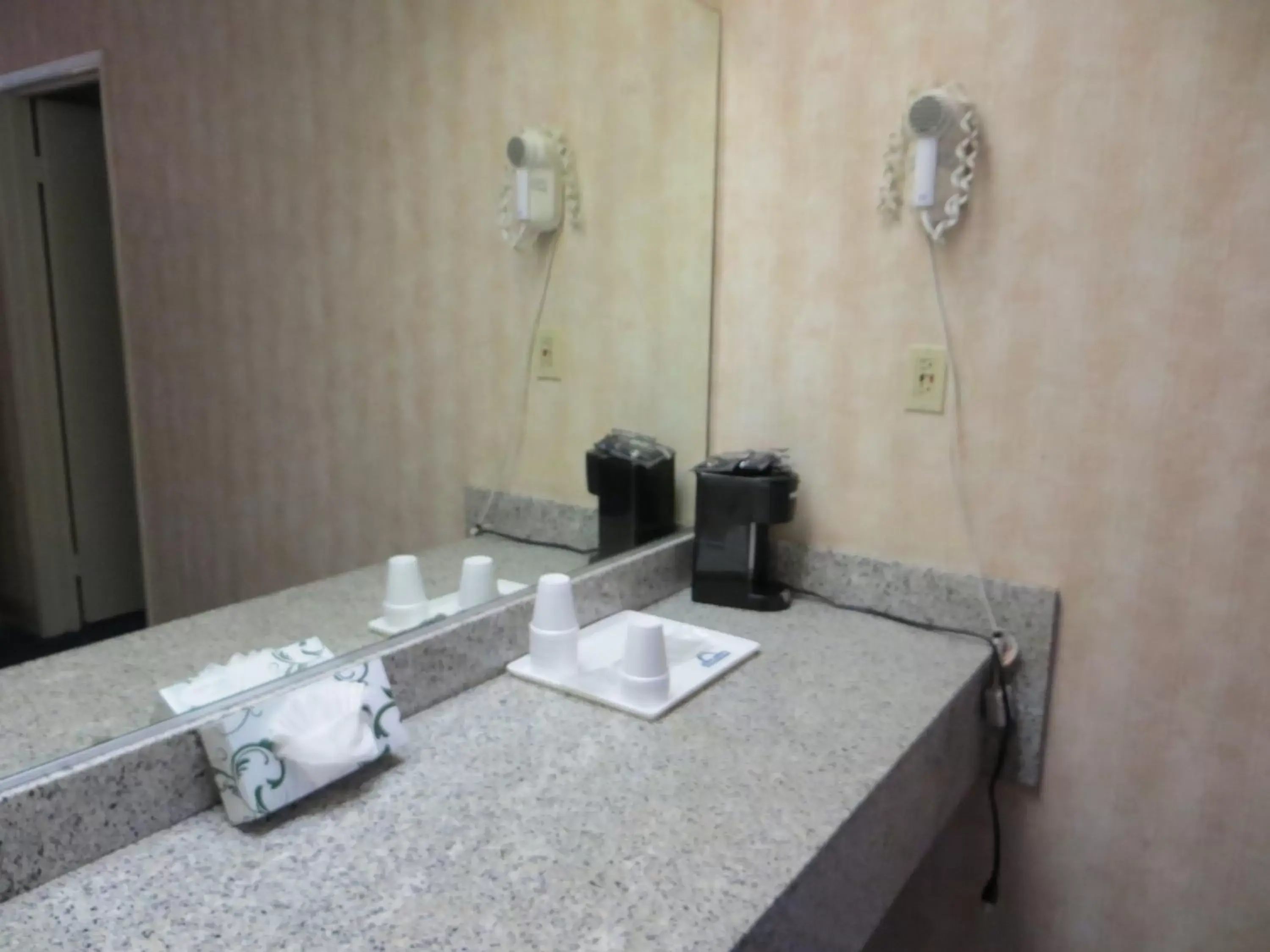 Bathroom in Days Inn by Wyndham Anaheim West