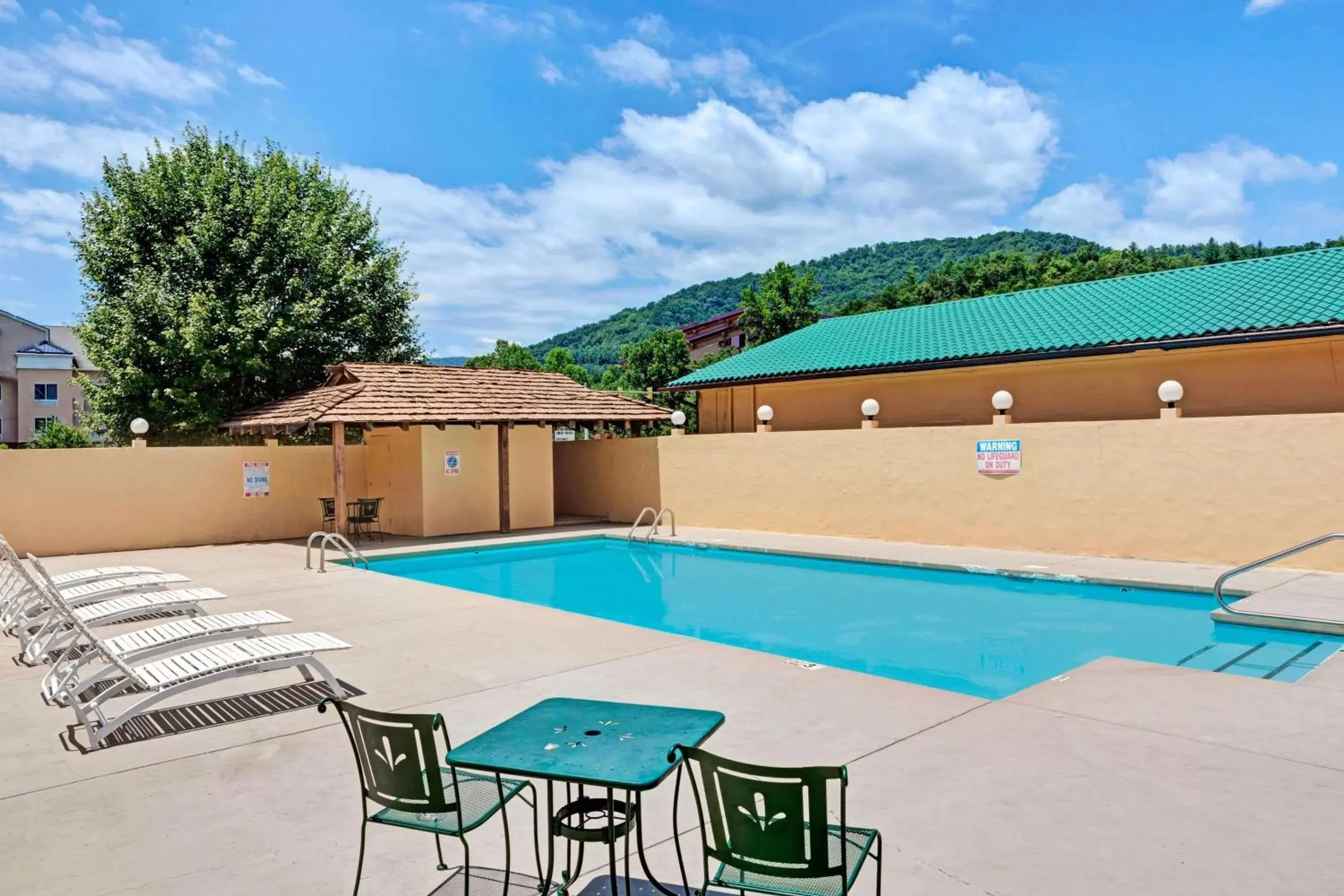 On site, Swimming Pool in Days Inn by Wyndham Cherokee Near Casino