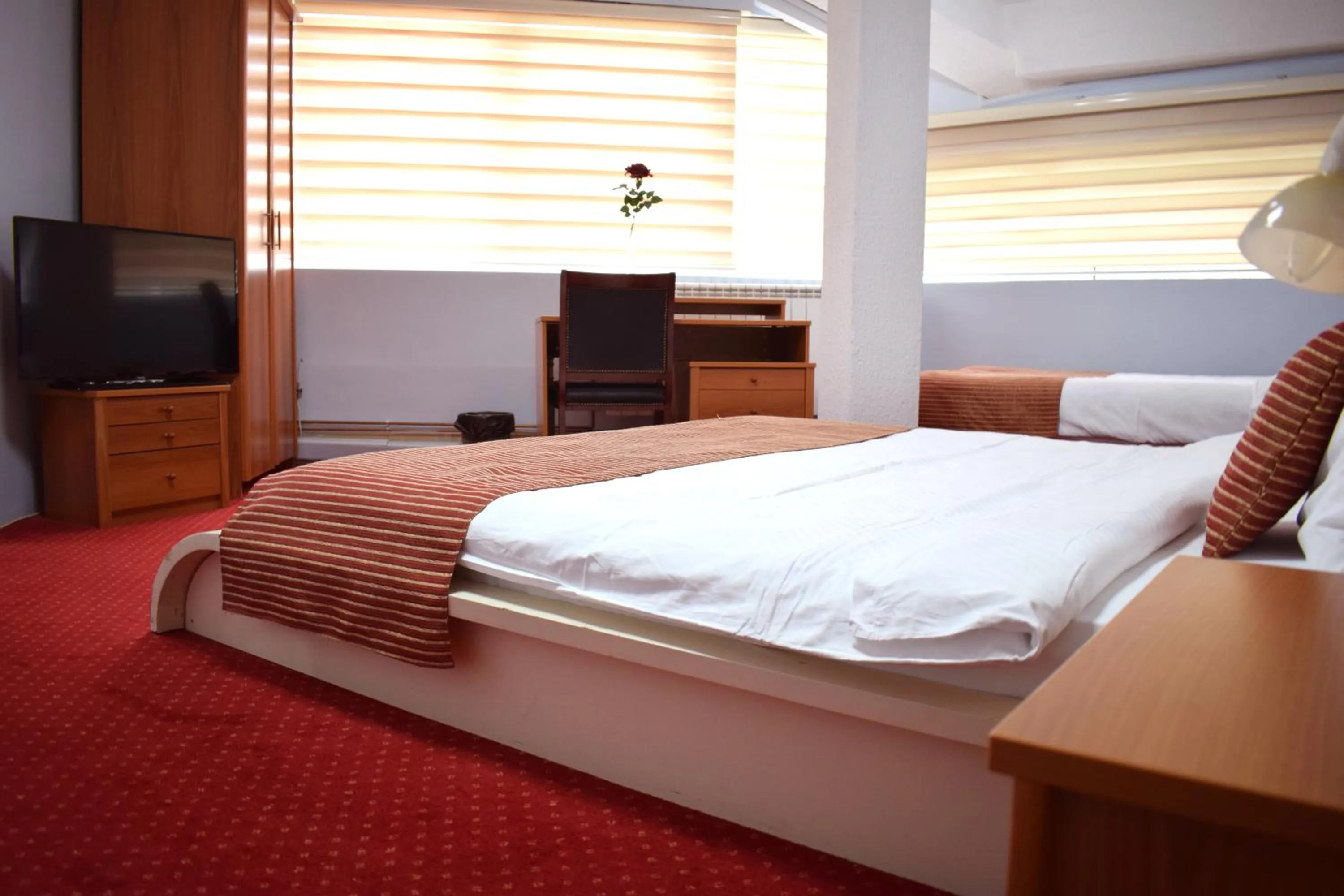 Bed in Hotel Aristocrat & Fish Restaurant