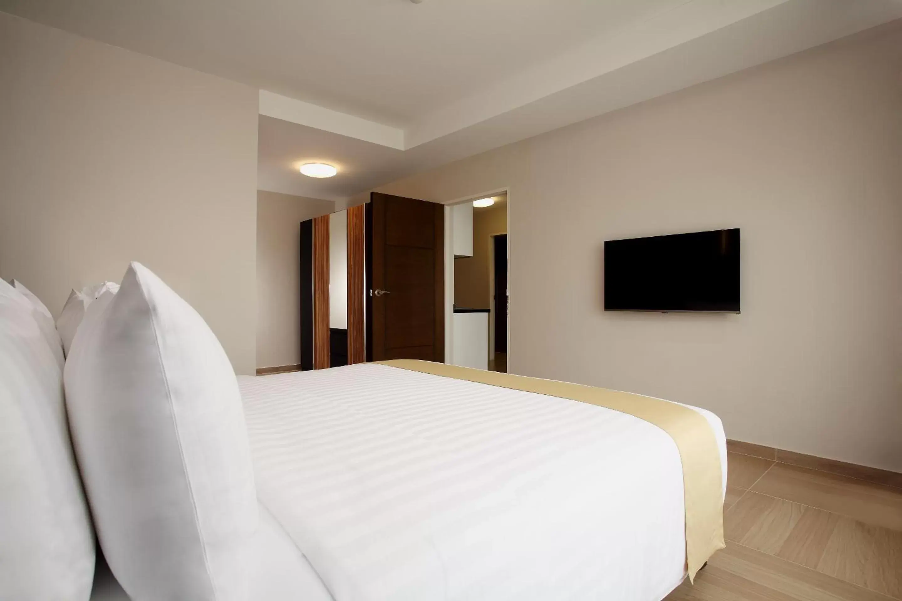 Bed in Chiva Bangkok Hotel - SHA Plus