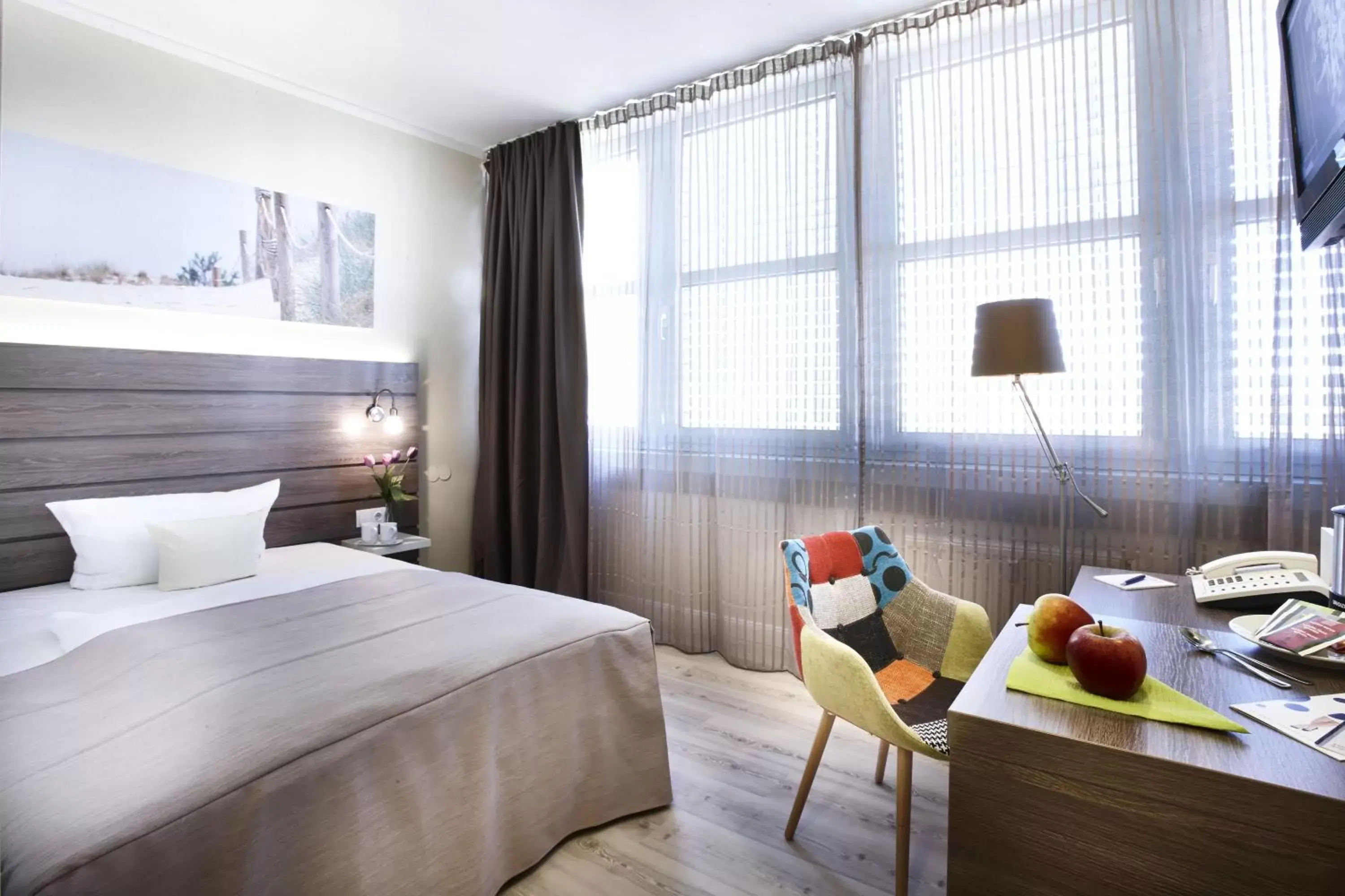Bedroom in Hotel Kiel by Golden Tulip