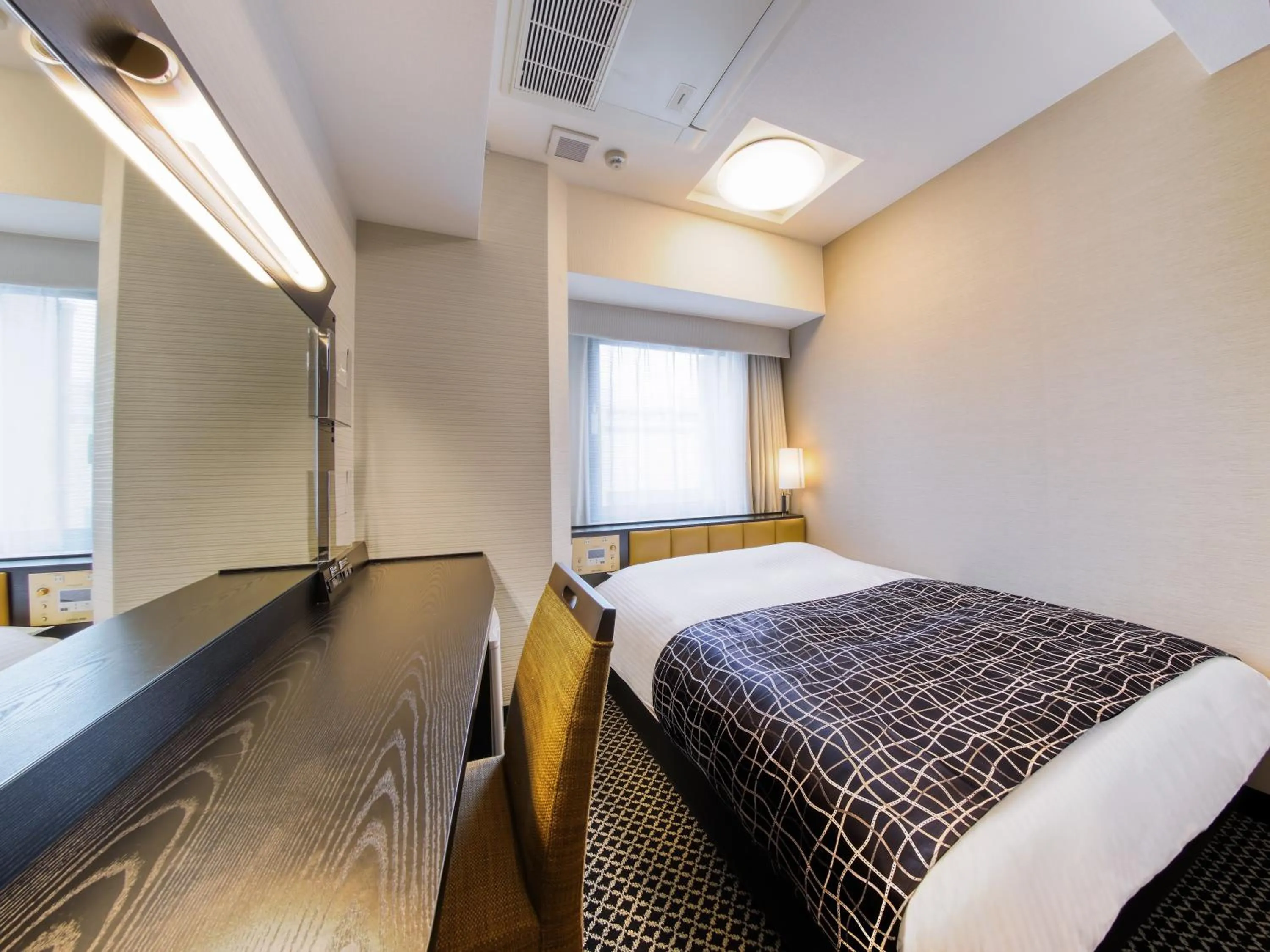 Photo of the whole room, Bed in APA Hotel Hiroshima Ekimae Ohashi