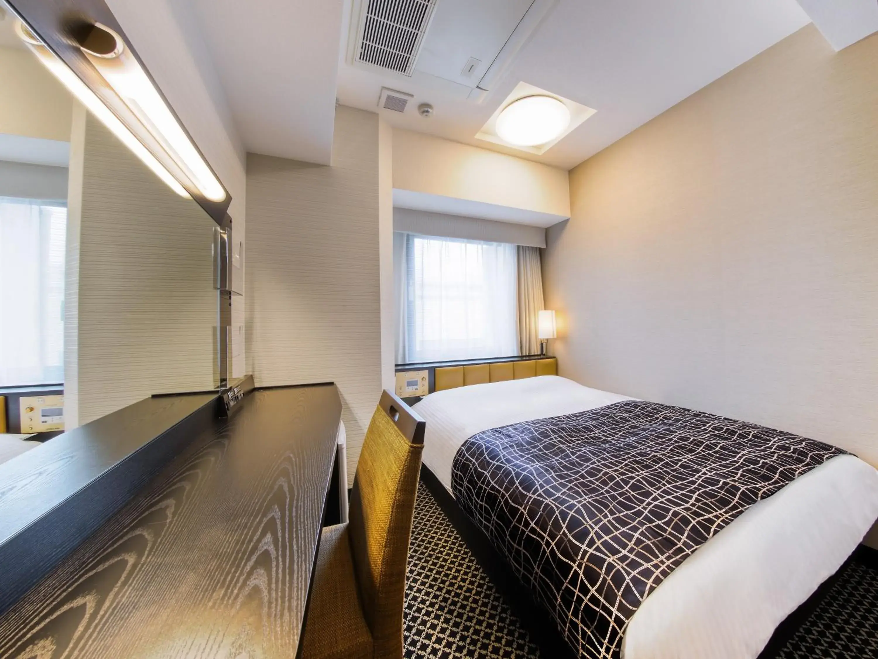 Photo of the whole room, Bed in APA Hotel Hiroshima Ekimae Ohashi Photo of the whole room, Bed in APA Hotel Hiroshima Ekimae Ohashi