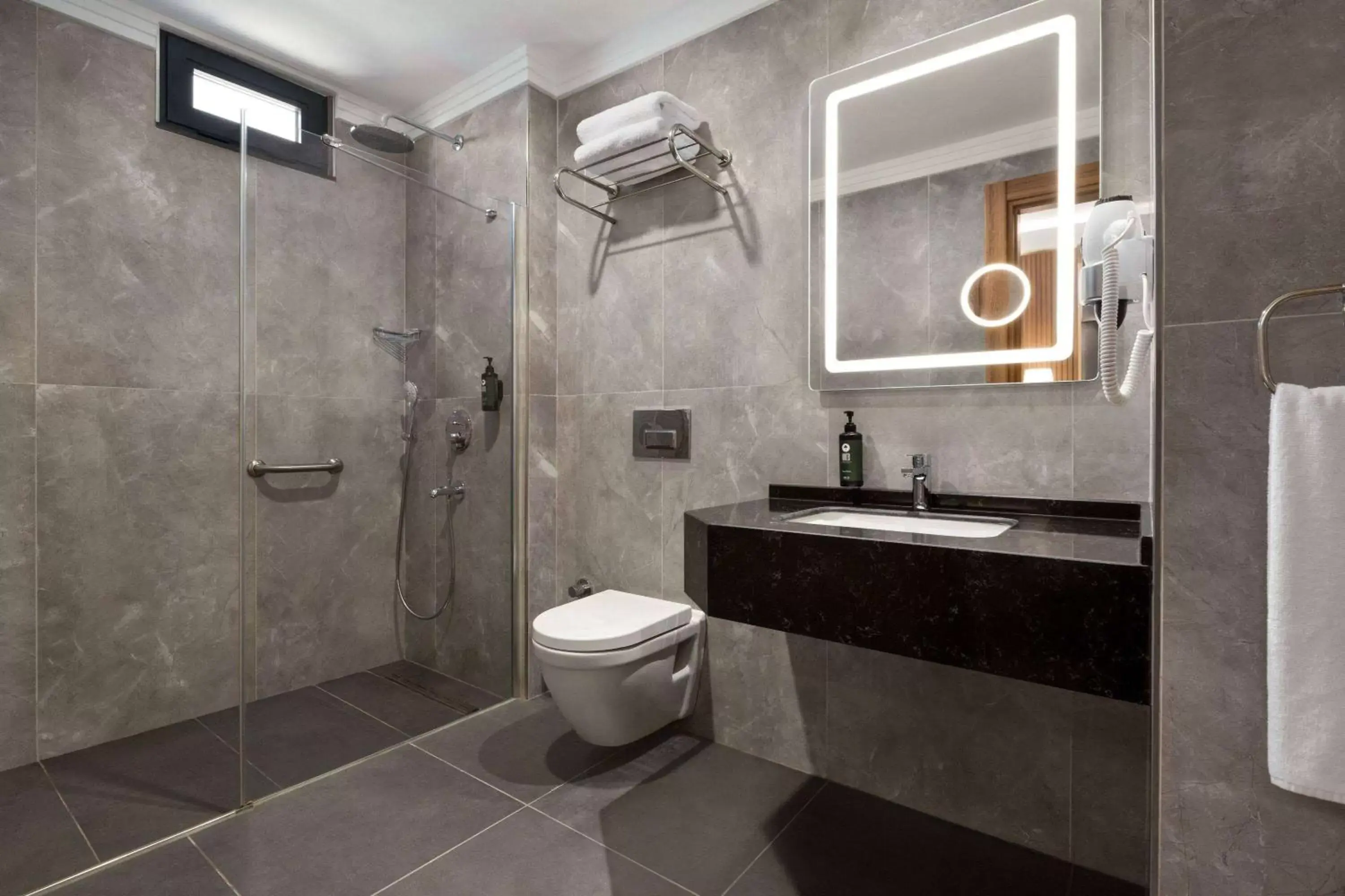 TV and multimedia, Bathroom in Ramada Encore by Wyndham Istanbul Sisli